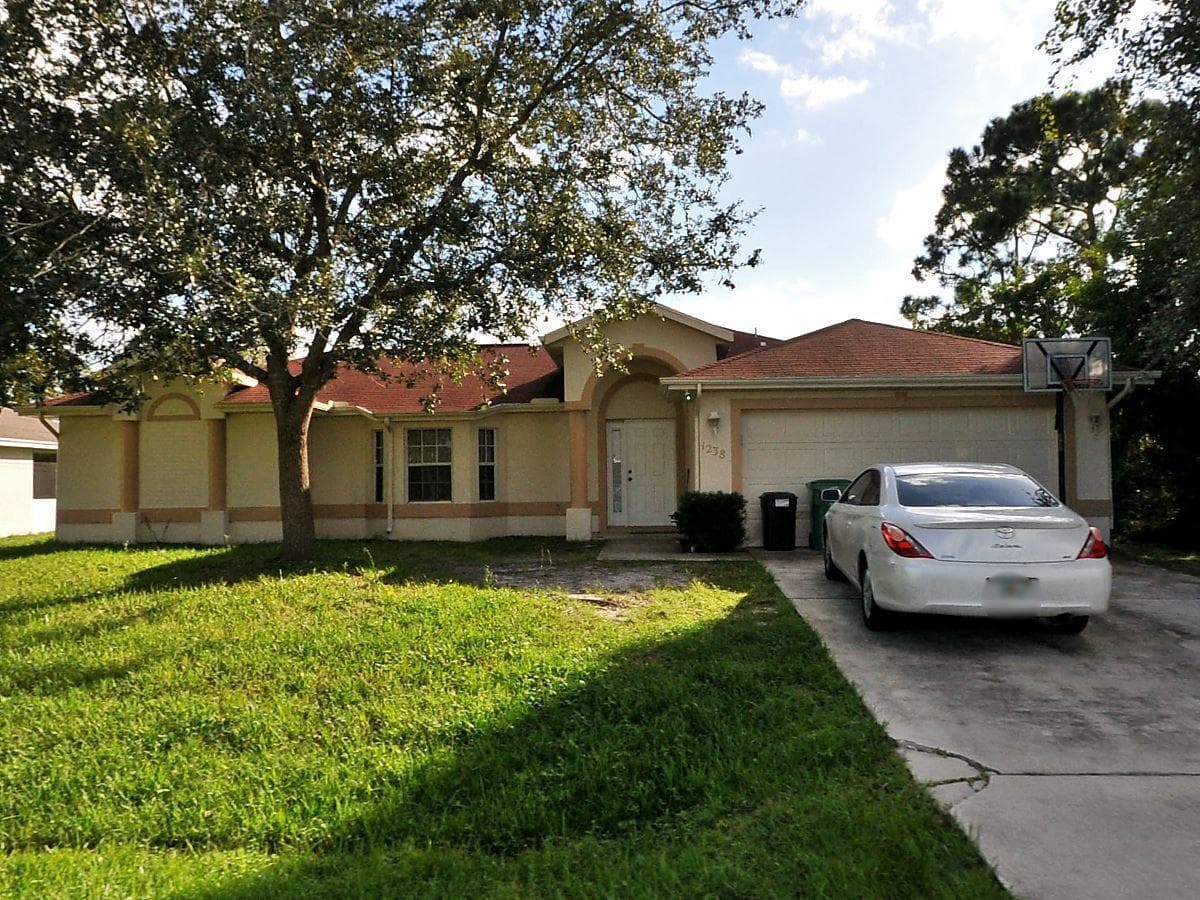 1238 SW Albenga Avenue, Port St. Lucie, FL 34953 — photo 2 of 2