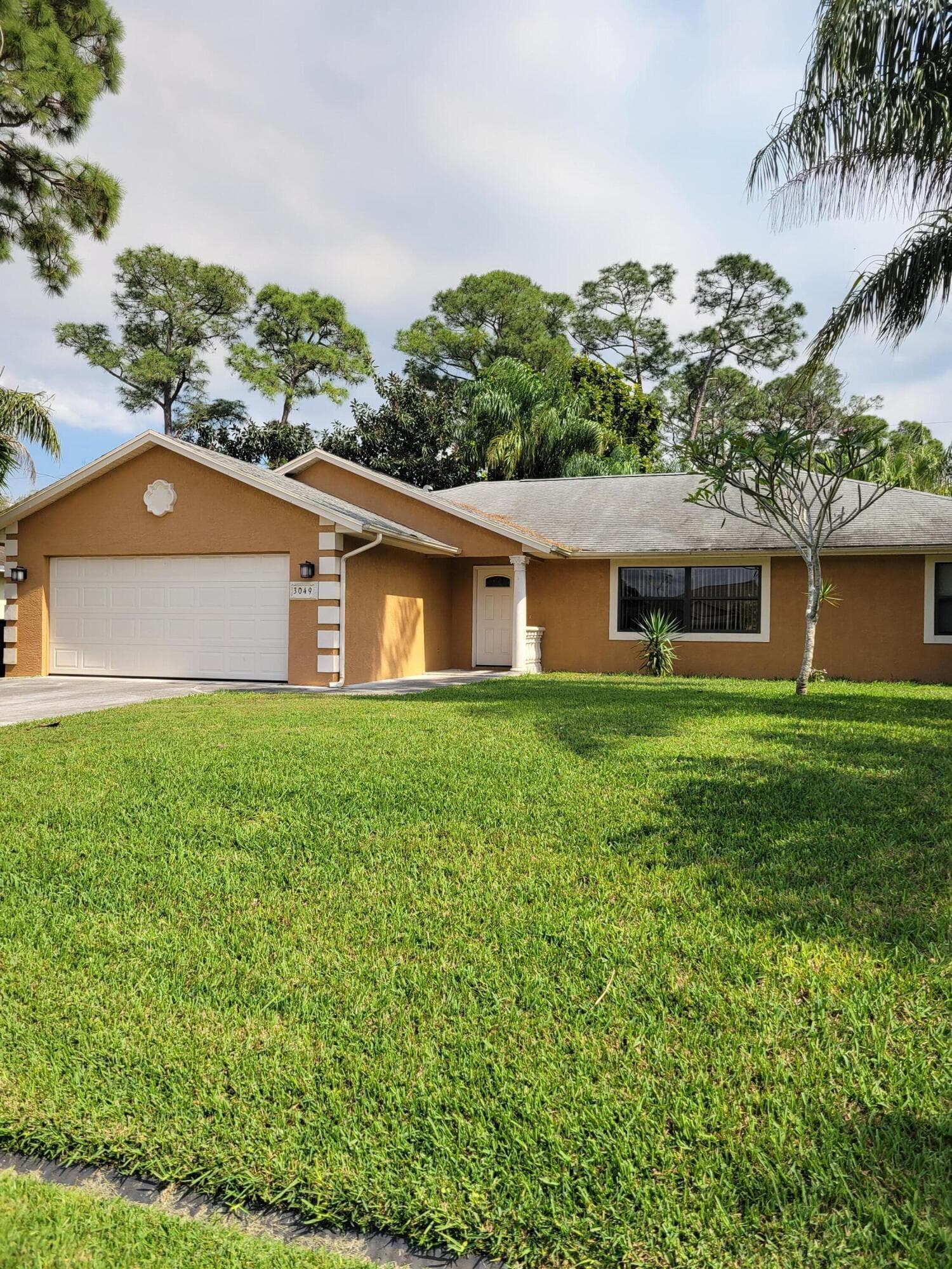 3049 SW Circle Street, Port St. Lucie, FL 34953 — photo 1 of 21