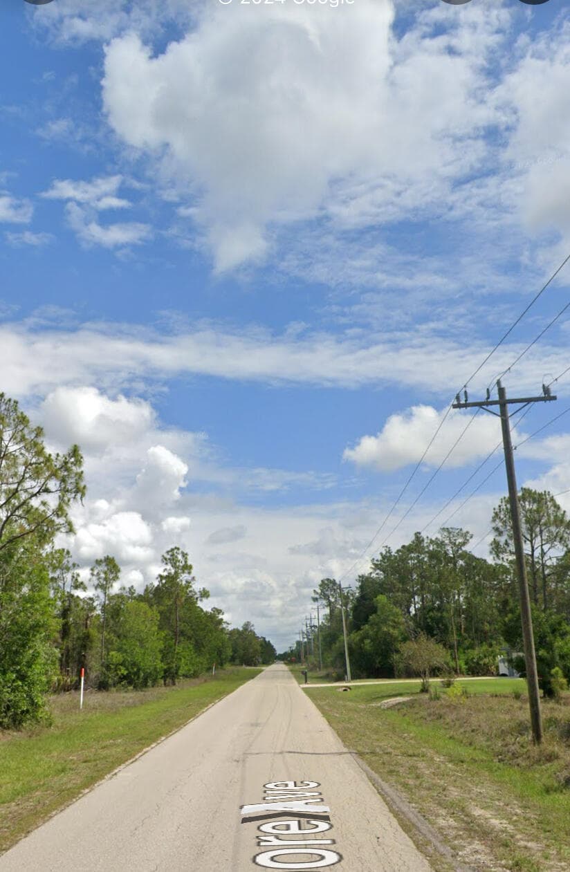 109 Moore Avenue, Lehigh Acres, FL 33936 — photo 2 of 5
