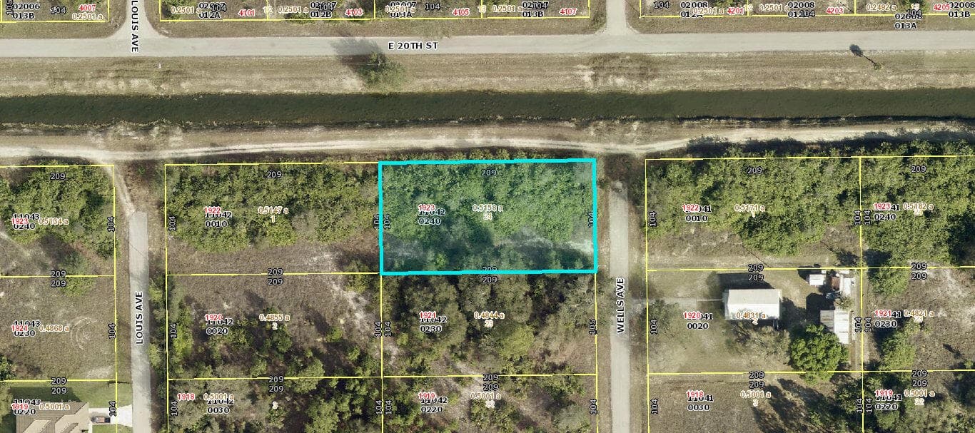 1923 Wells Avenue, Lehigh Acres, FL 33972 — photo 1 of 3