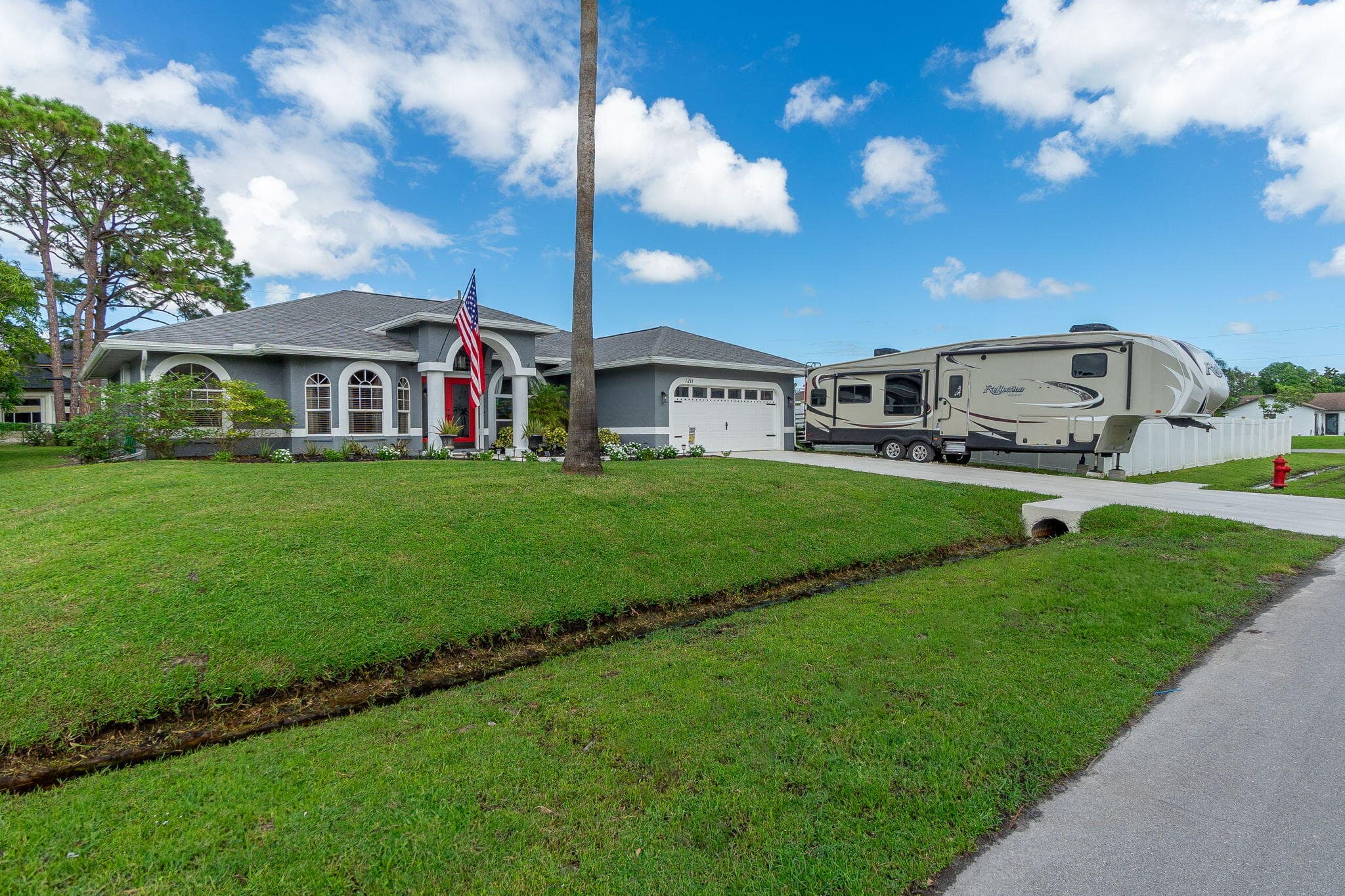 1211 SW Porter Road, Port St. Lucie, FL 34953 — photo 2 of 43