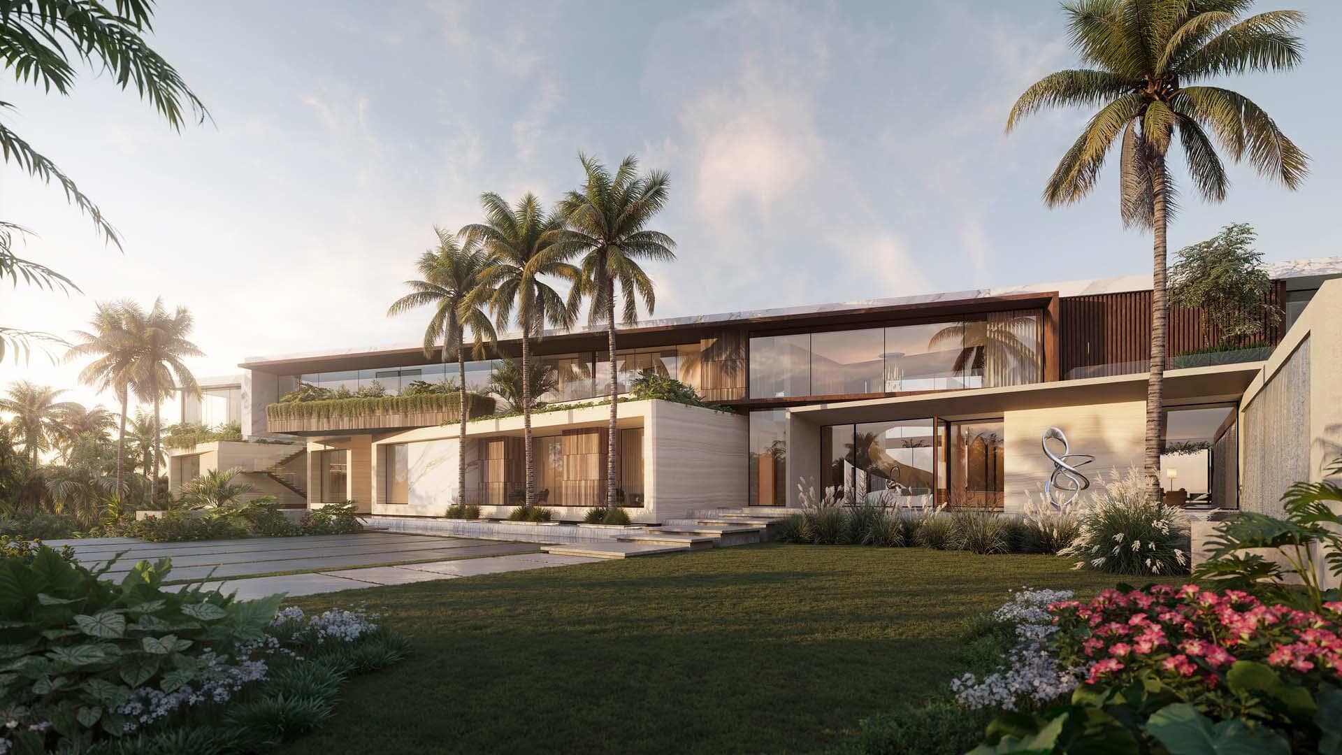 Modern oceanfront estate at golden hour in Manalapan
