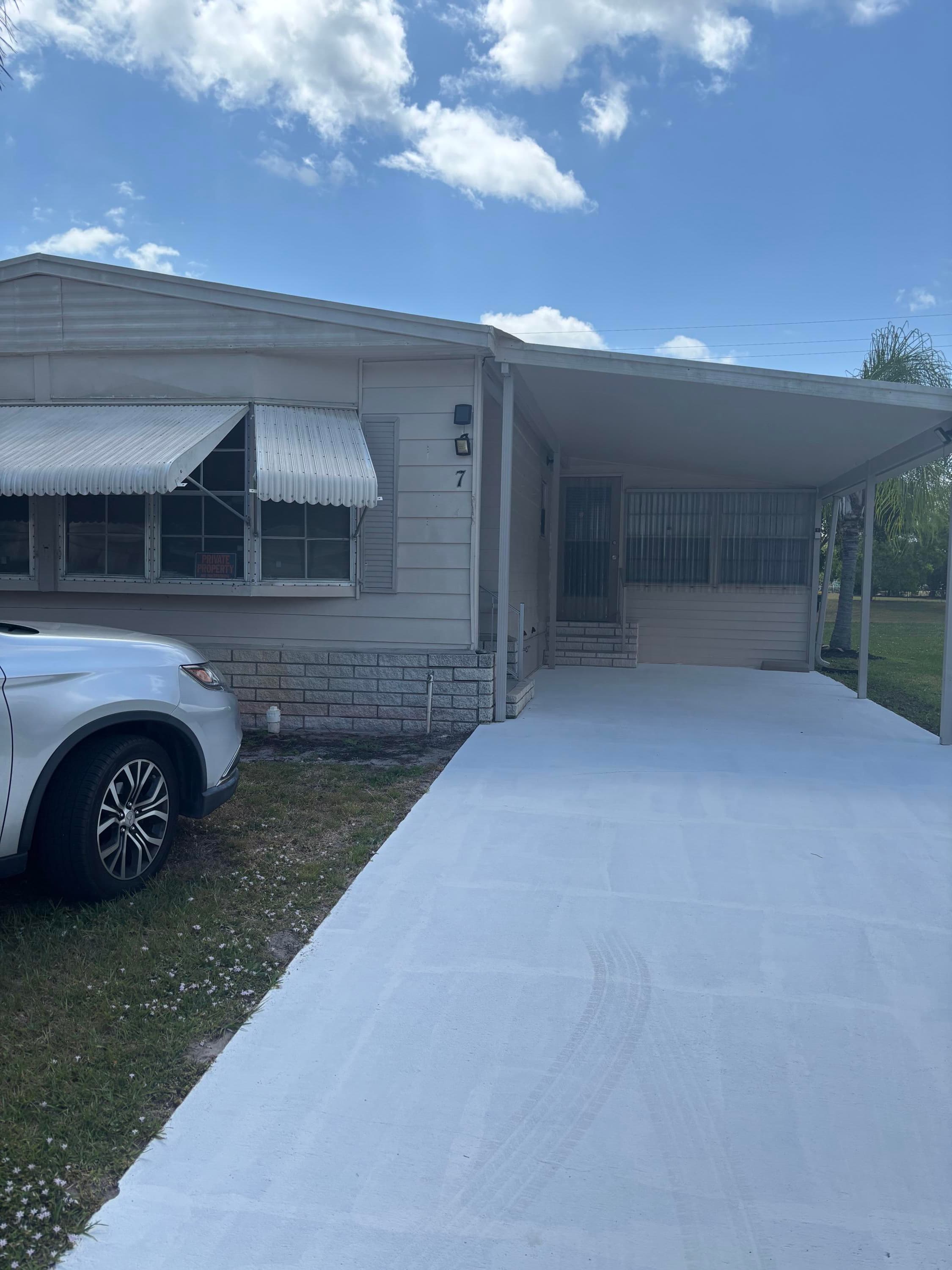 7 Villa Flores, Port St. Lucie, FL 34952 — photo 1 of 31