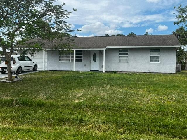 8602 Lakeland Boulevard, Fort Pierce, FL 34951 — photo 1 of 4