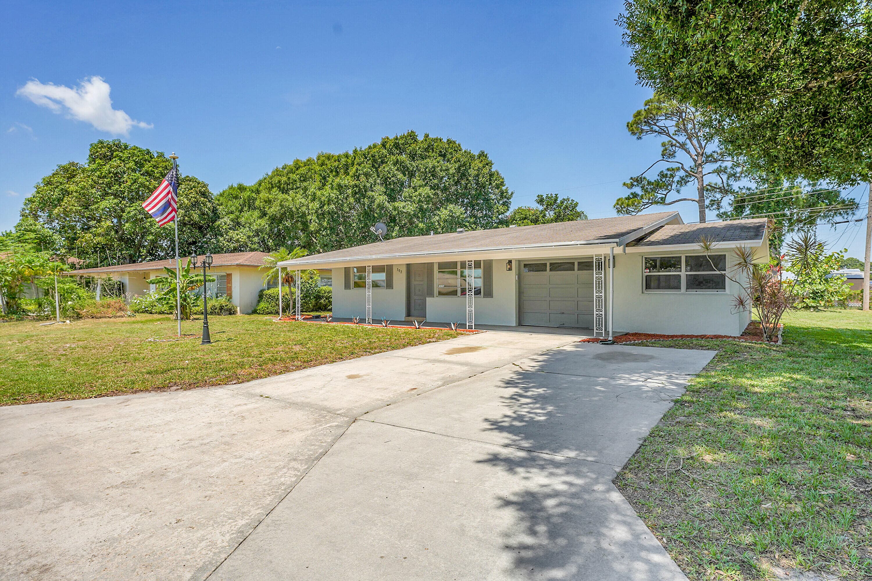 302 W Arbor Avenue, Port St. Lucie, FL 34952 — photo 1 of 25