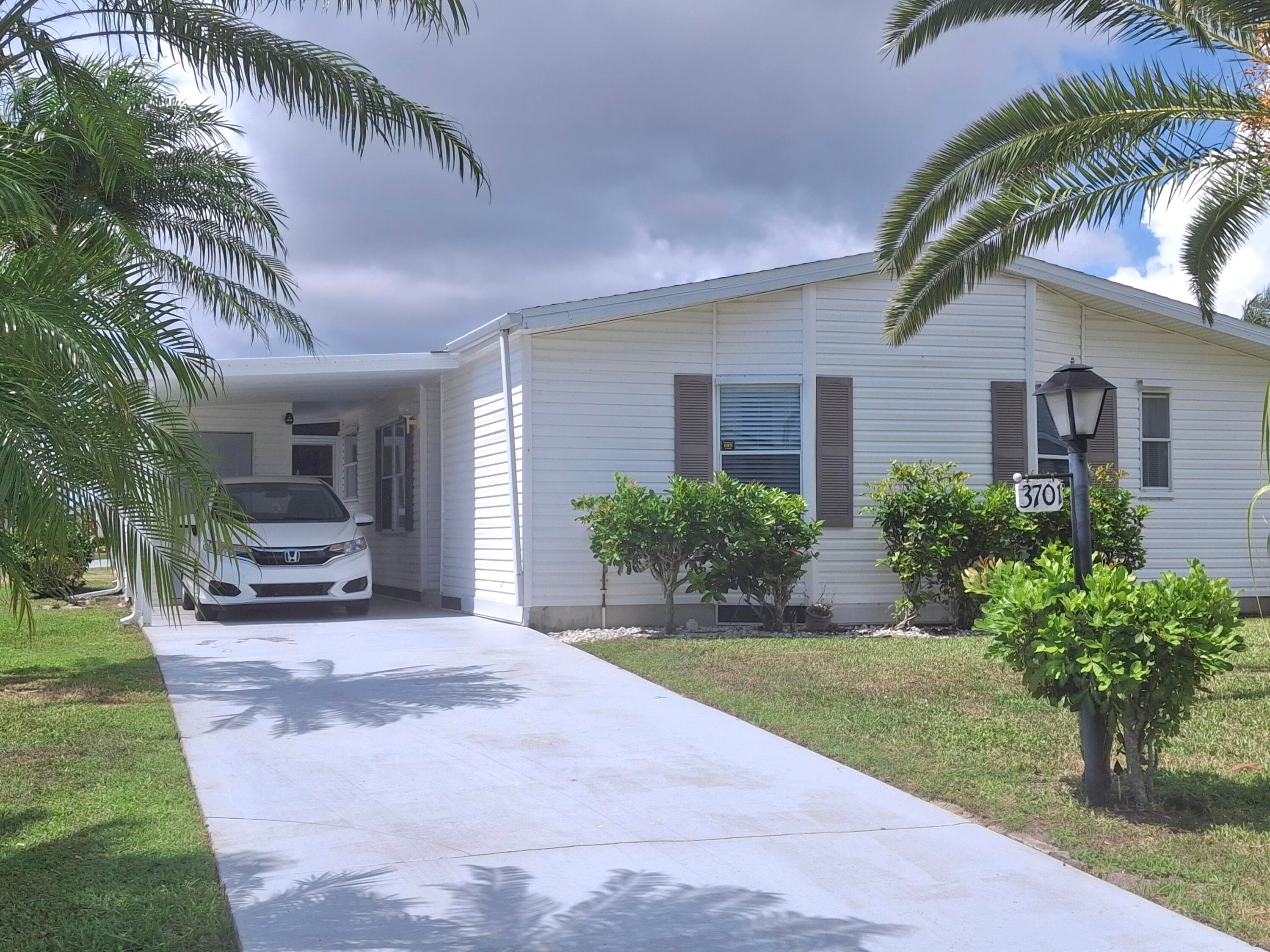 3701 Sleepy Hollow Lane, Port St. Lucie, FL 34952 — photo 2 of 34