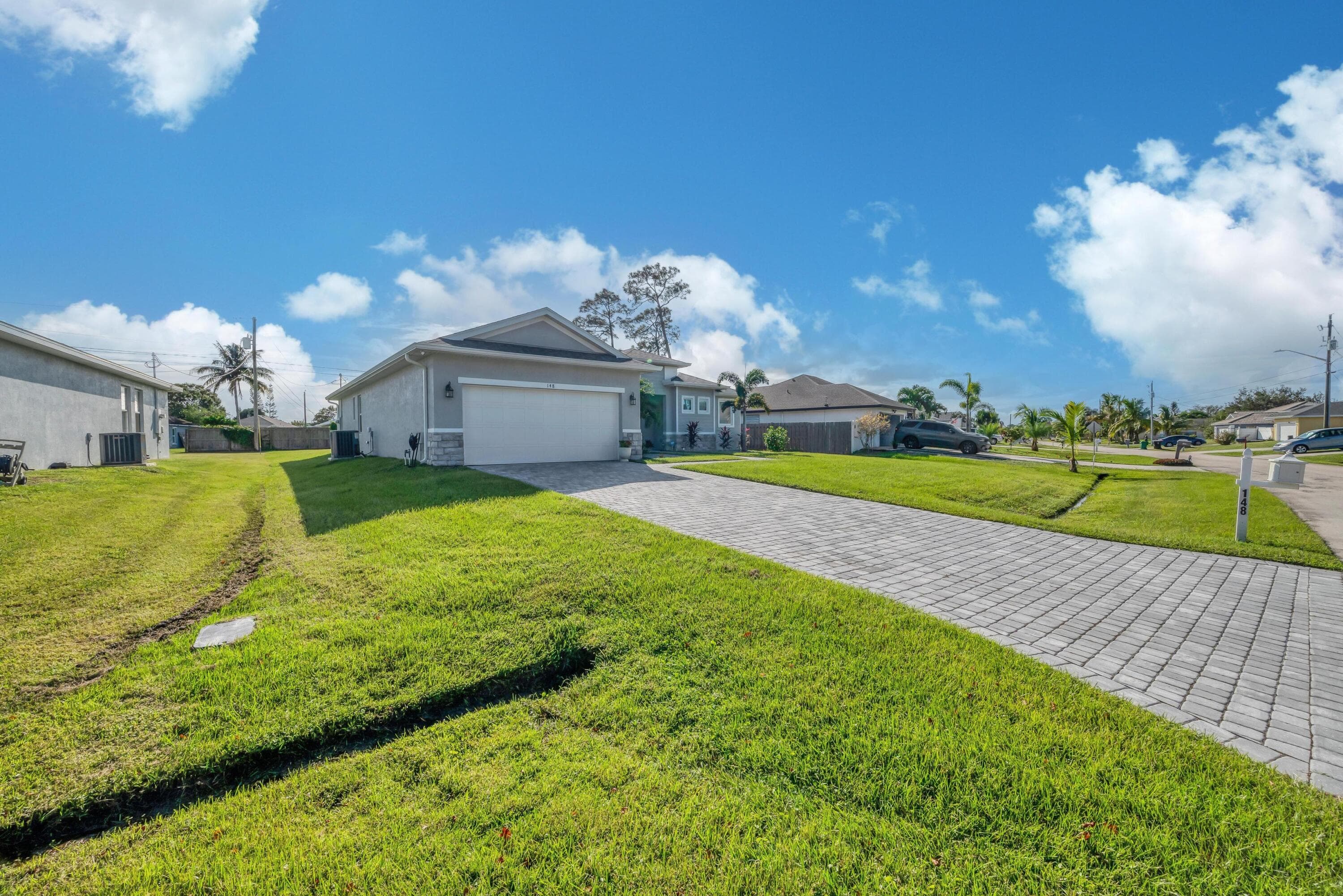 148 SW Sea Lion Road, Port St. Lucie, FL 34953 — photo 3 of 42