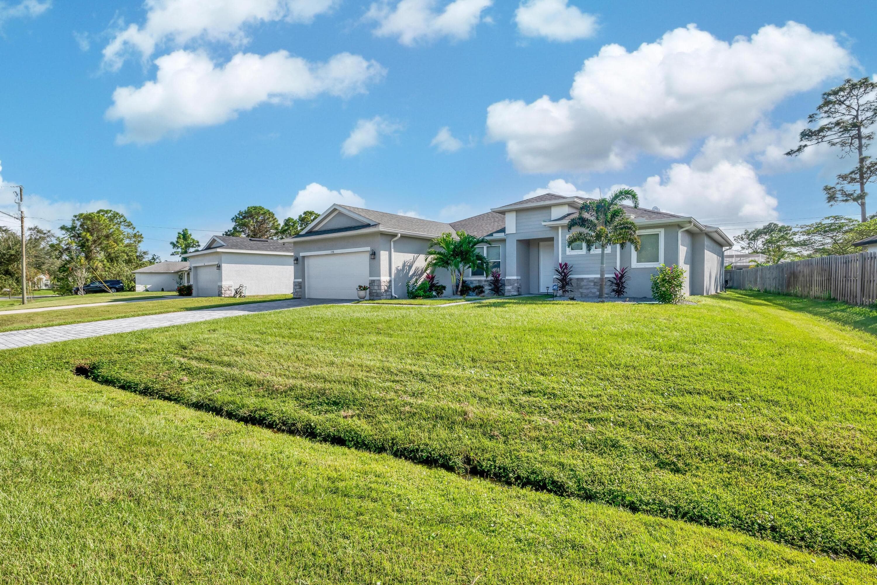 148 SW Sea Lion Road, Port St. Lucie, FL 34953 — photo 2 of 42