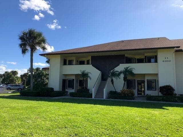 6303 SE Williamsburg Drive 201, Hobe Sound, FL 33455 — photo 1 of 19