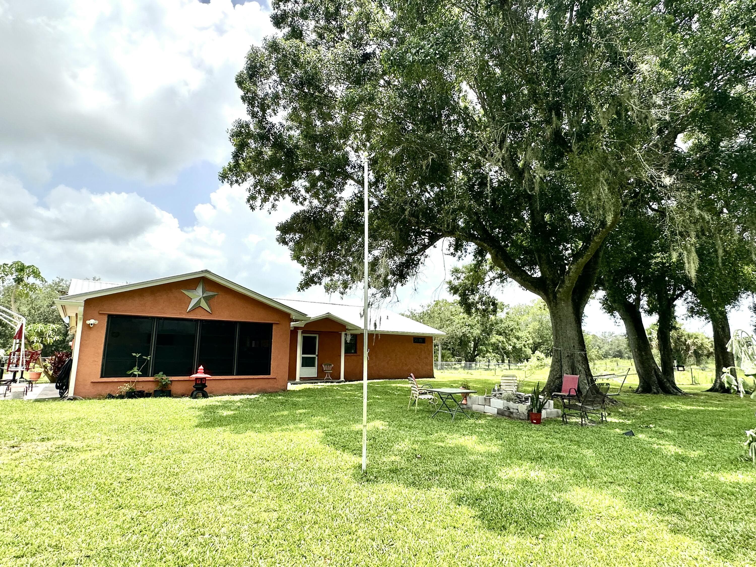 840 NW 141st Street, Okeechobee, FL 34972 — photo 1 of 40