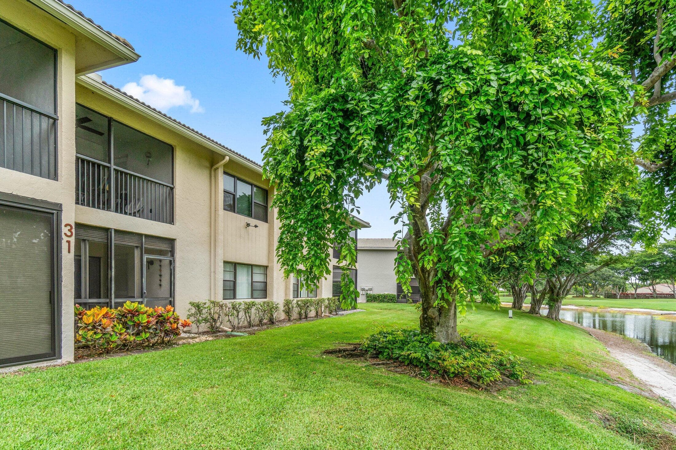 31 Stratford Lane C, Boynton Beach, FL 33436 — photo 1 of 58