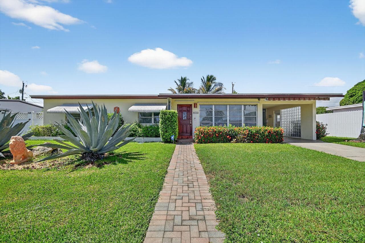 133 Greenbrier Drive, Palm Springs, FL 33461 — photo 1 of 66