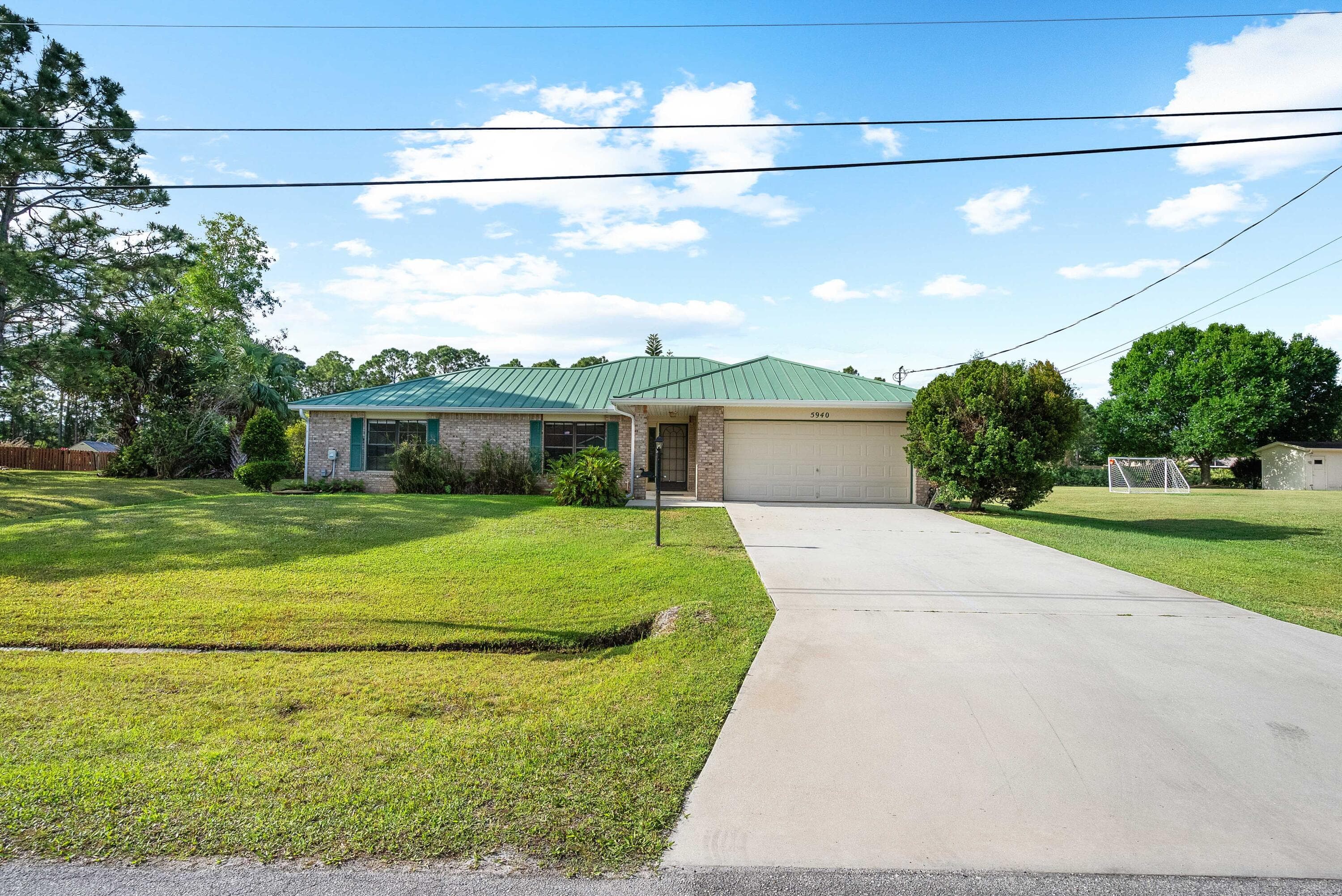5940 NW Brenda Circle, Port St. Lucie, FL 34986 — photo 28 of 32