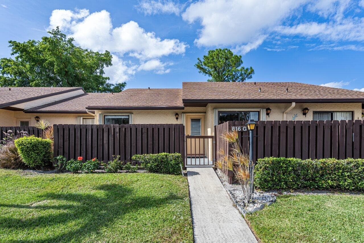 816 Sky Pine Way G, Greenacres, FL 33415 — photo 1 of 38