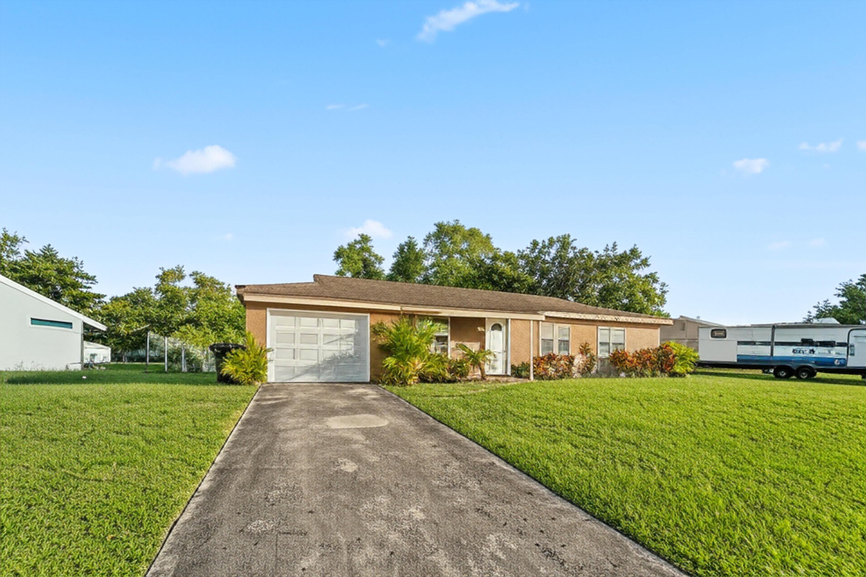 226 SW Kimball Circle, Port St. Lucie, FL 34953 — photo 1 of 19