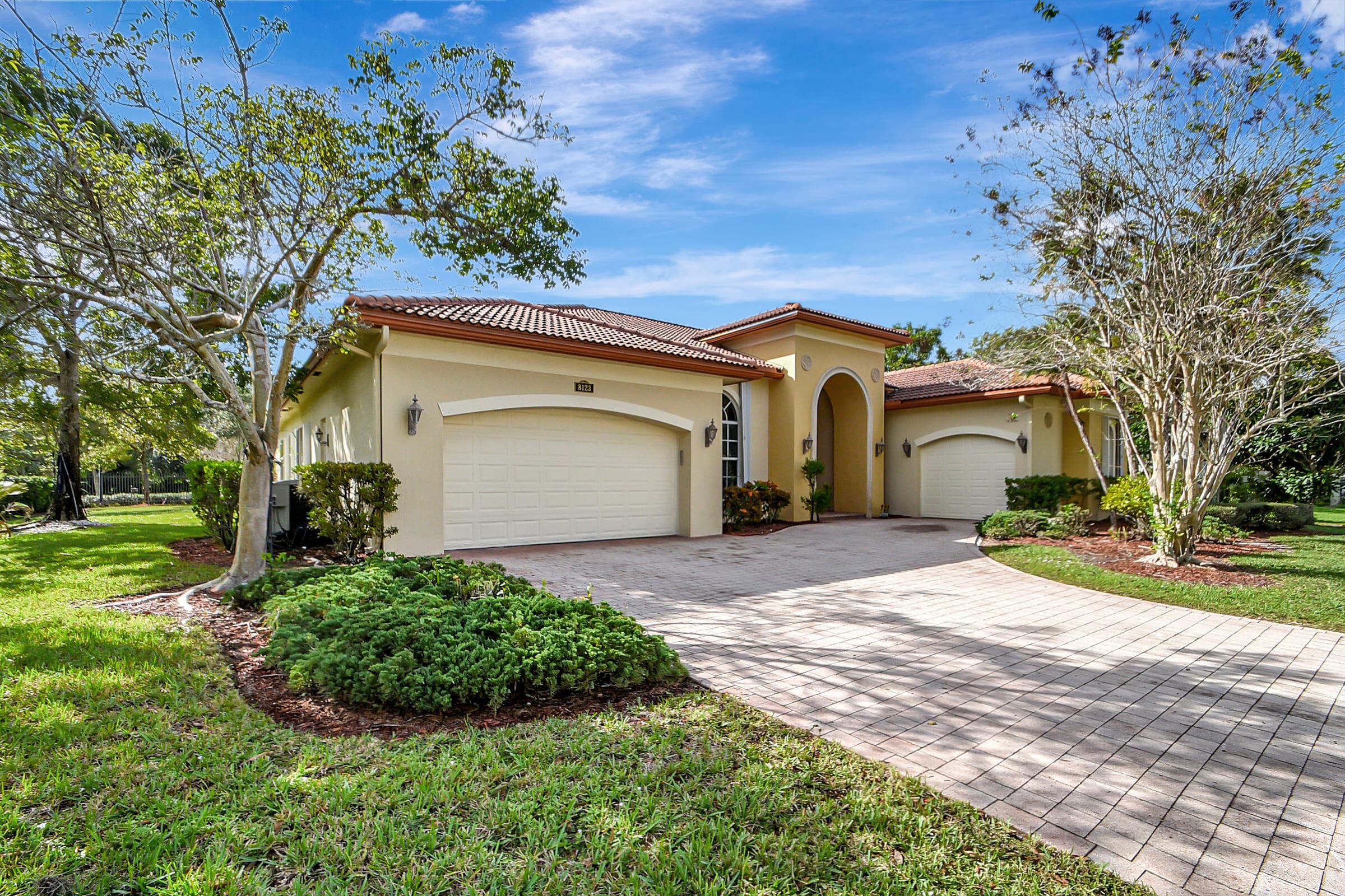 8123 Woodslanding Trail, West Palm Beach, FL 33411 — photo 1 of 48