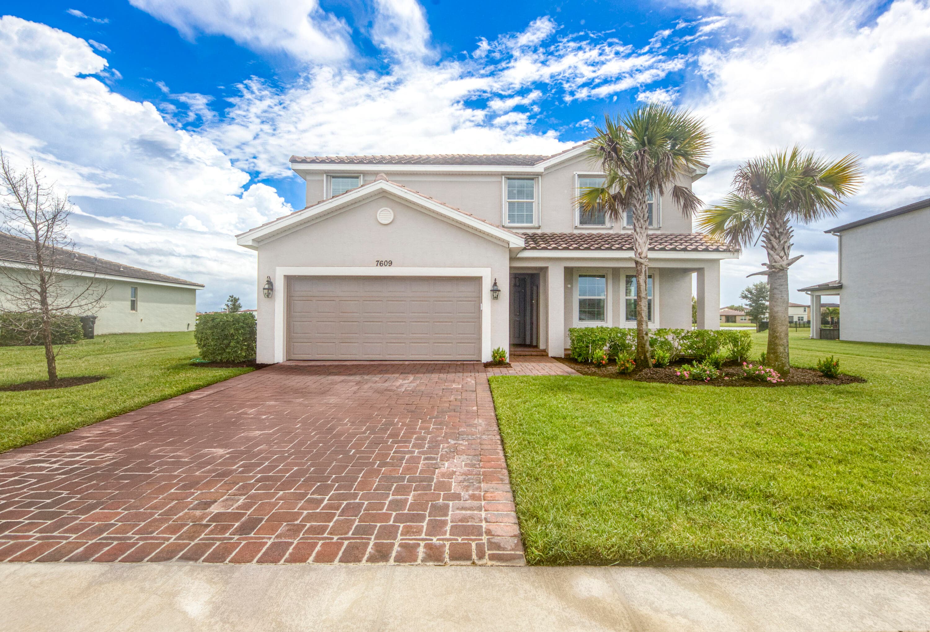 7609 NW Archerfield Drive, Port St. Lucie, FL 34987 — photo 1 of 69