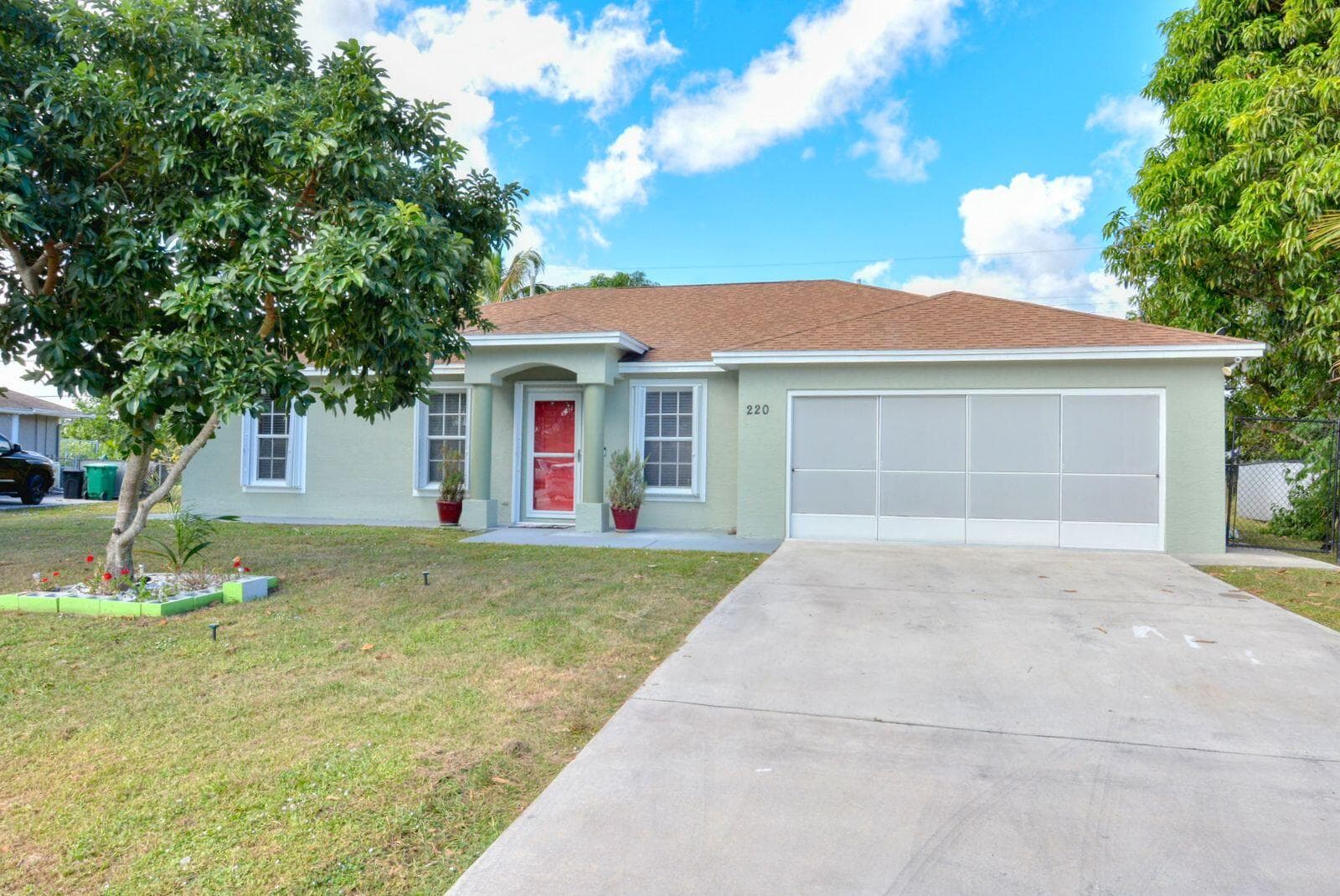 220 W Arbor Avenue, Port St. Lucie, FL 34952 — photo 1 of 32