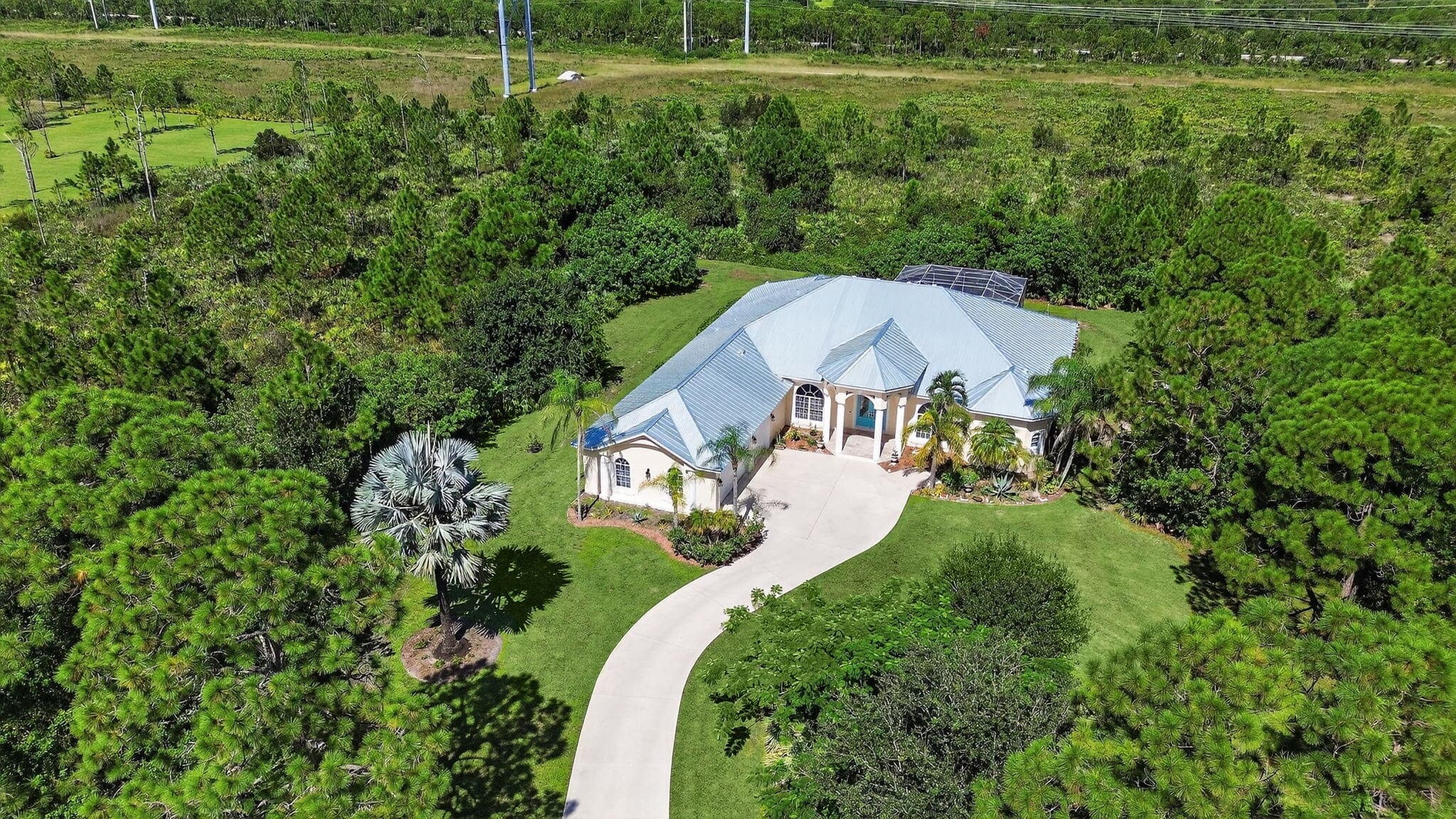 7820 SW Saddlebrook Drive, Port St. Lucie, FL 34986 — photo 1 of 47