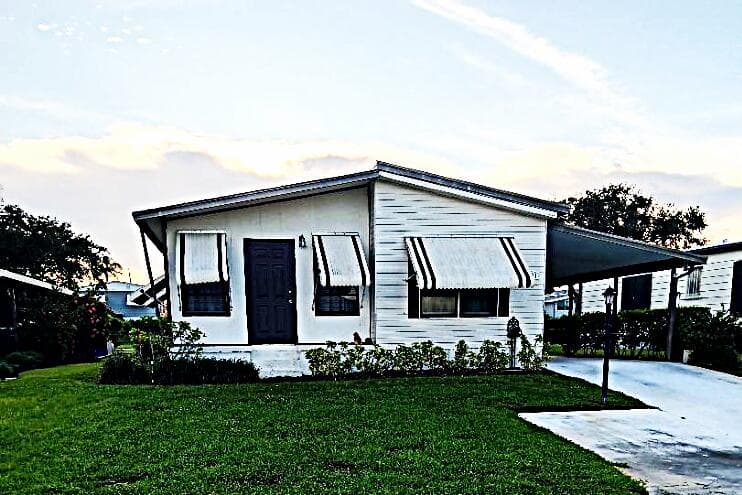 7781 SE Shenandoah Drive, Hobe Sound, FL 33455 — photo 1 of 27