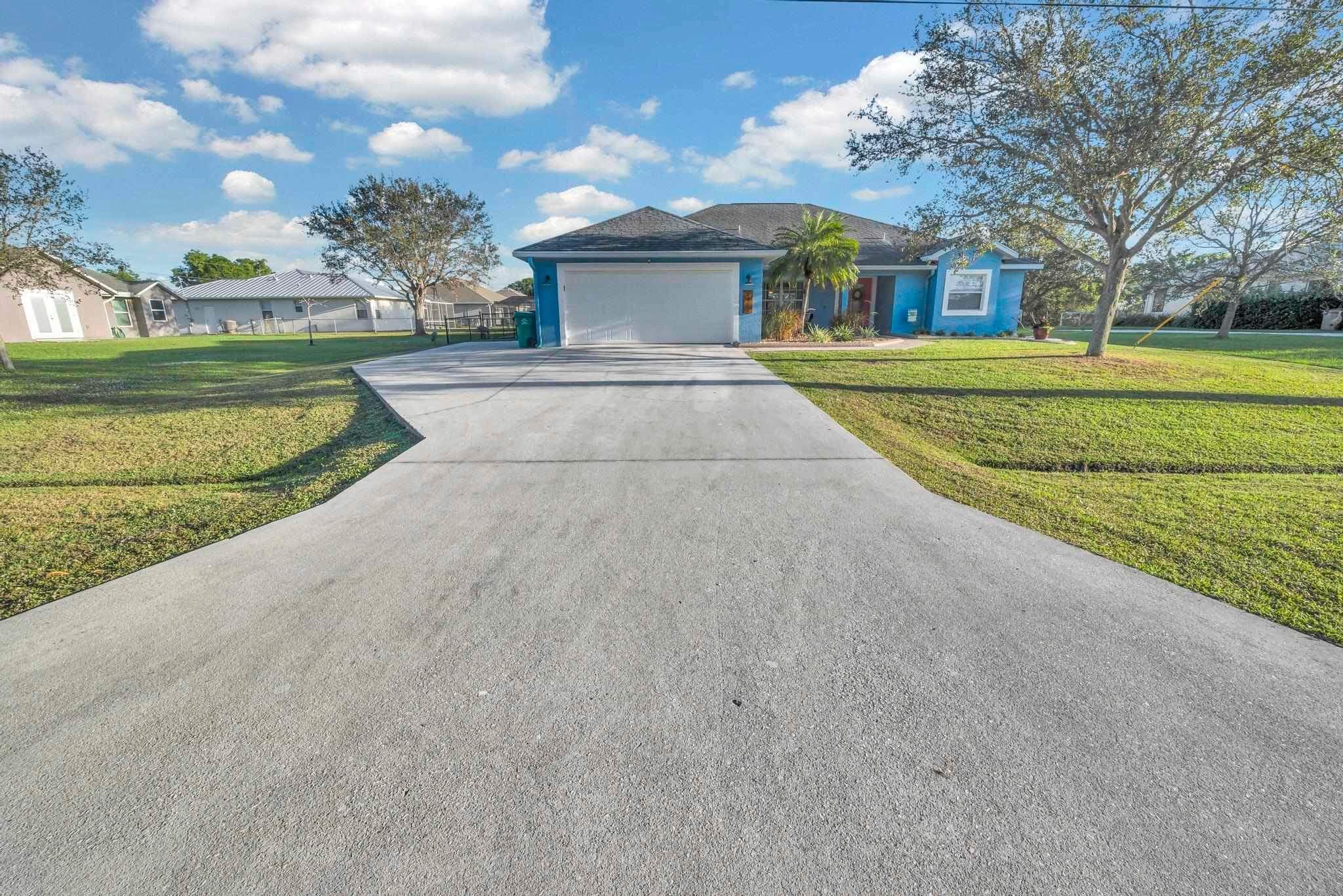 5464 NW Milner Drive, Port St. Lucie, FL 34983 — photo 2 of 49