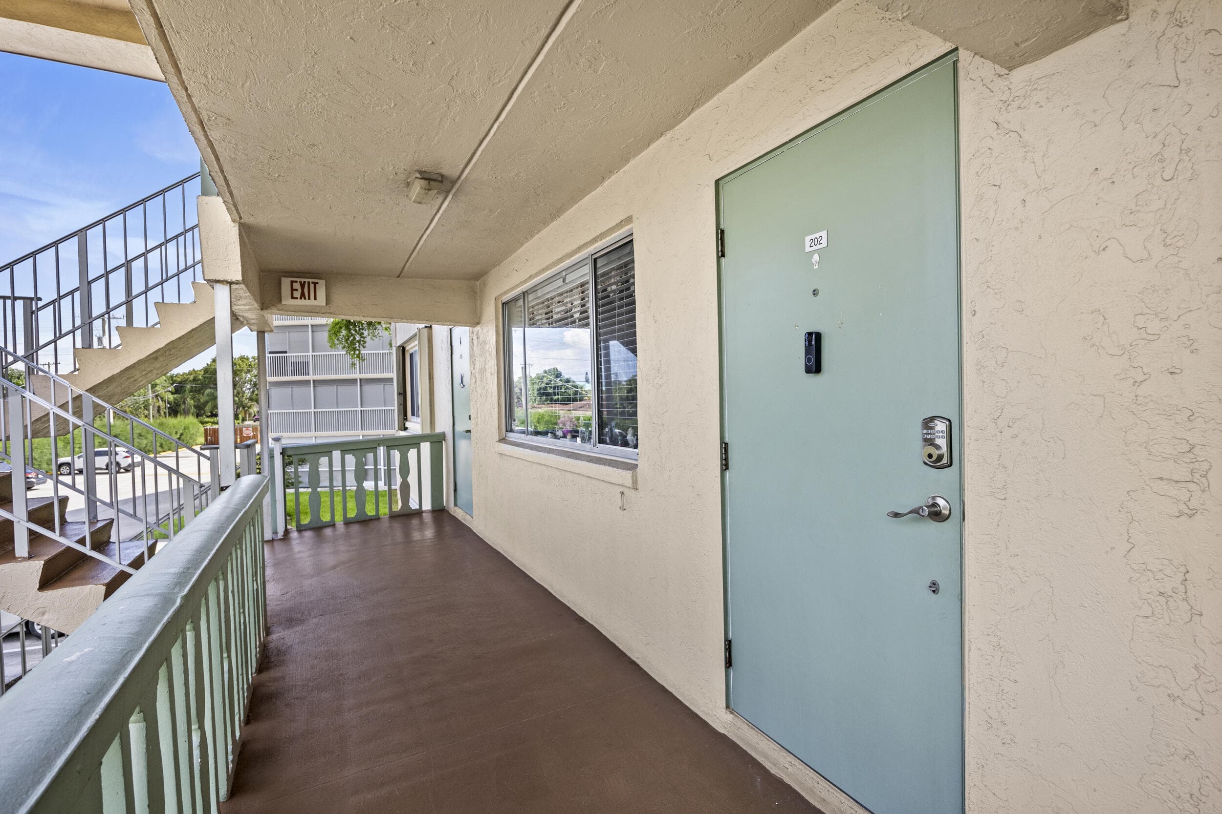 200 Village Green Circle E 202, Palm Springs, FL 33461 — photo 2 of 33