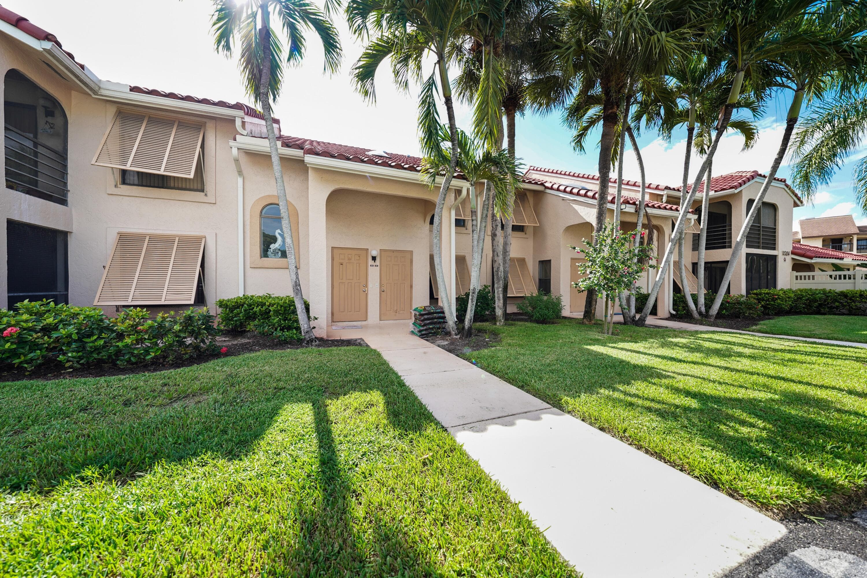 10204 Mangrove Drive 103, Boynton Beach, FL 33437 — photo 1 of 23