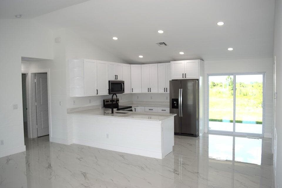 7542 NW 83rd Court, Okeechobee, FL 34972 — photo 13 of 56