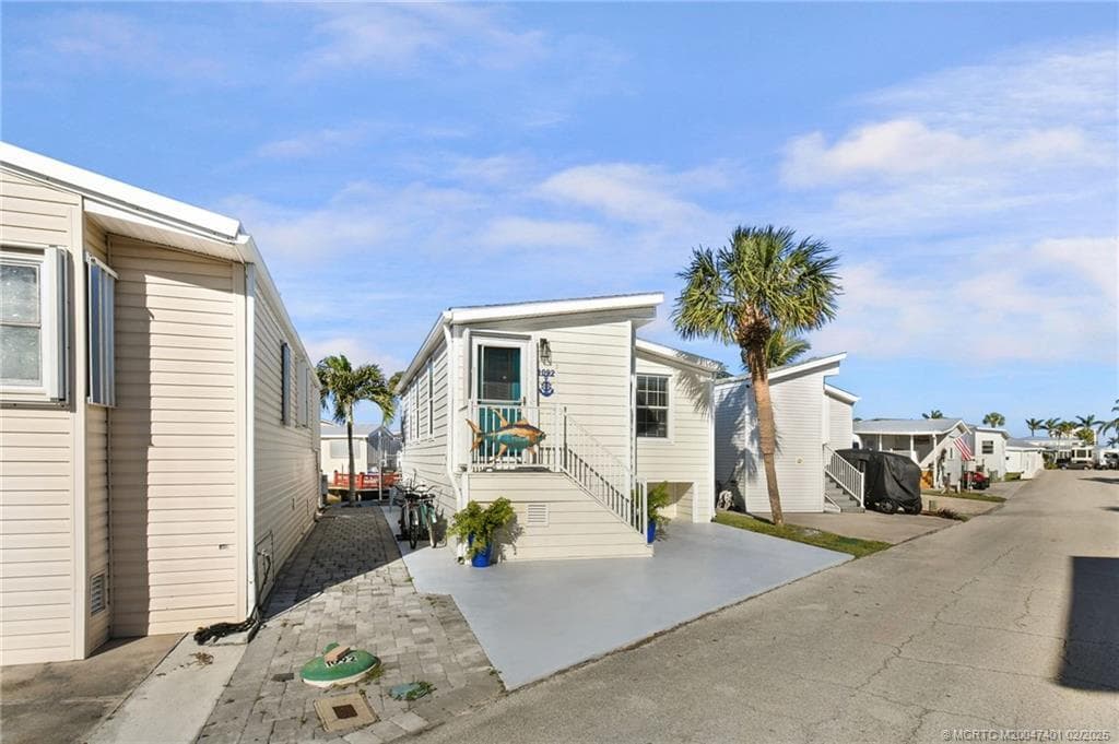 1092 Nettles Boulevard, Jensen Beach, FL 34957 — photo 1 of 35