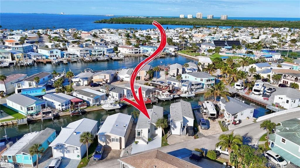 1092 Nettles Boulevard, Jensen Beach, FL 34957 — photo 2 of 35