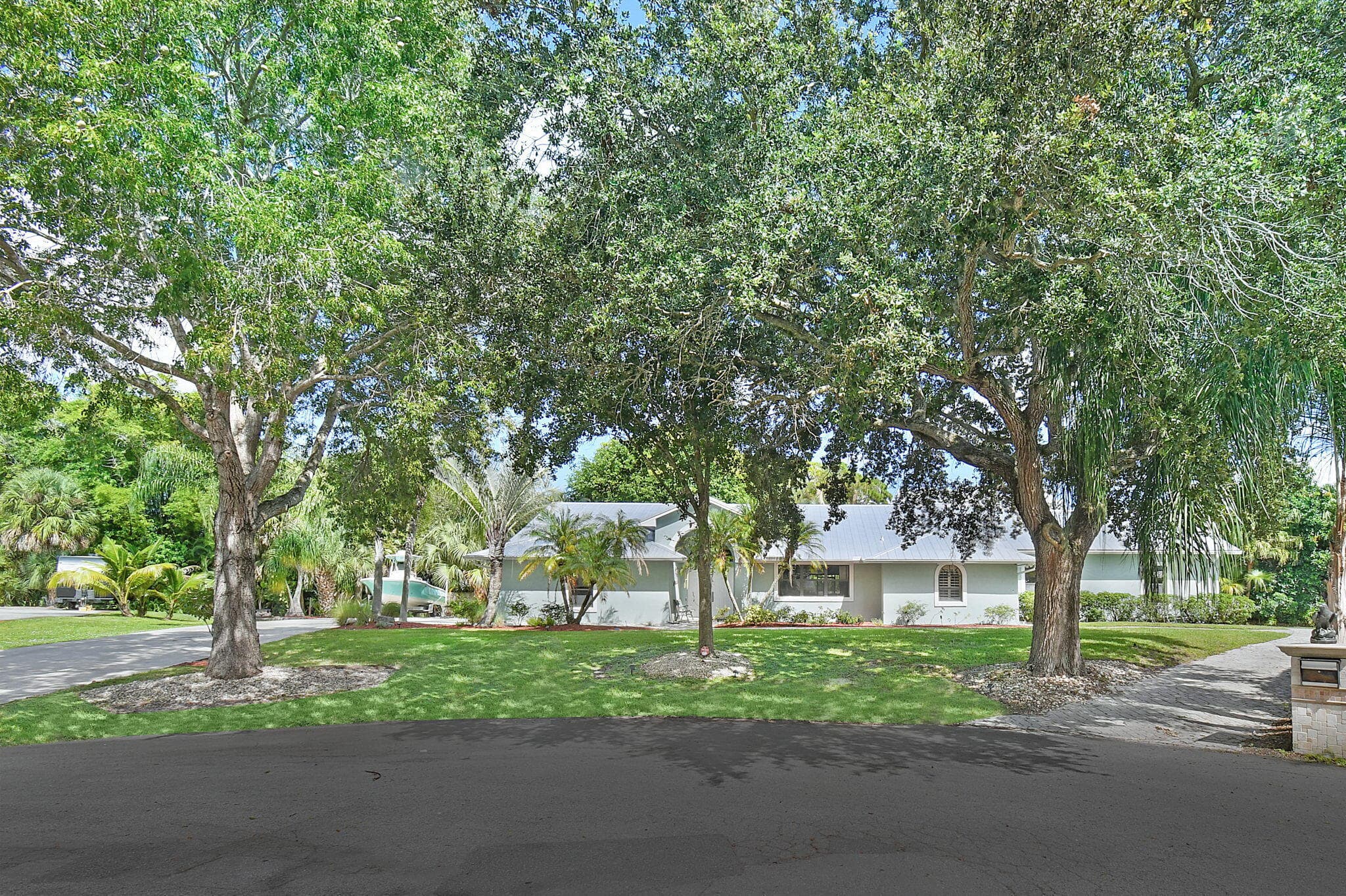 1225 SW Magnolia Bluff Drive, Palm City, FL 34990 — photo 1 of 52