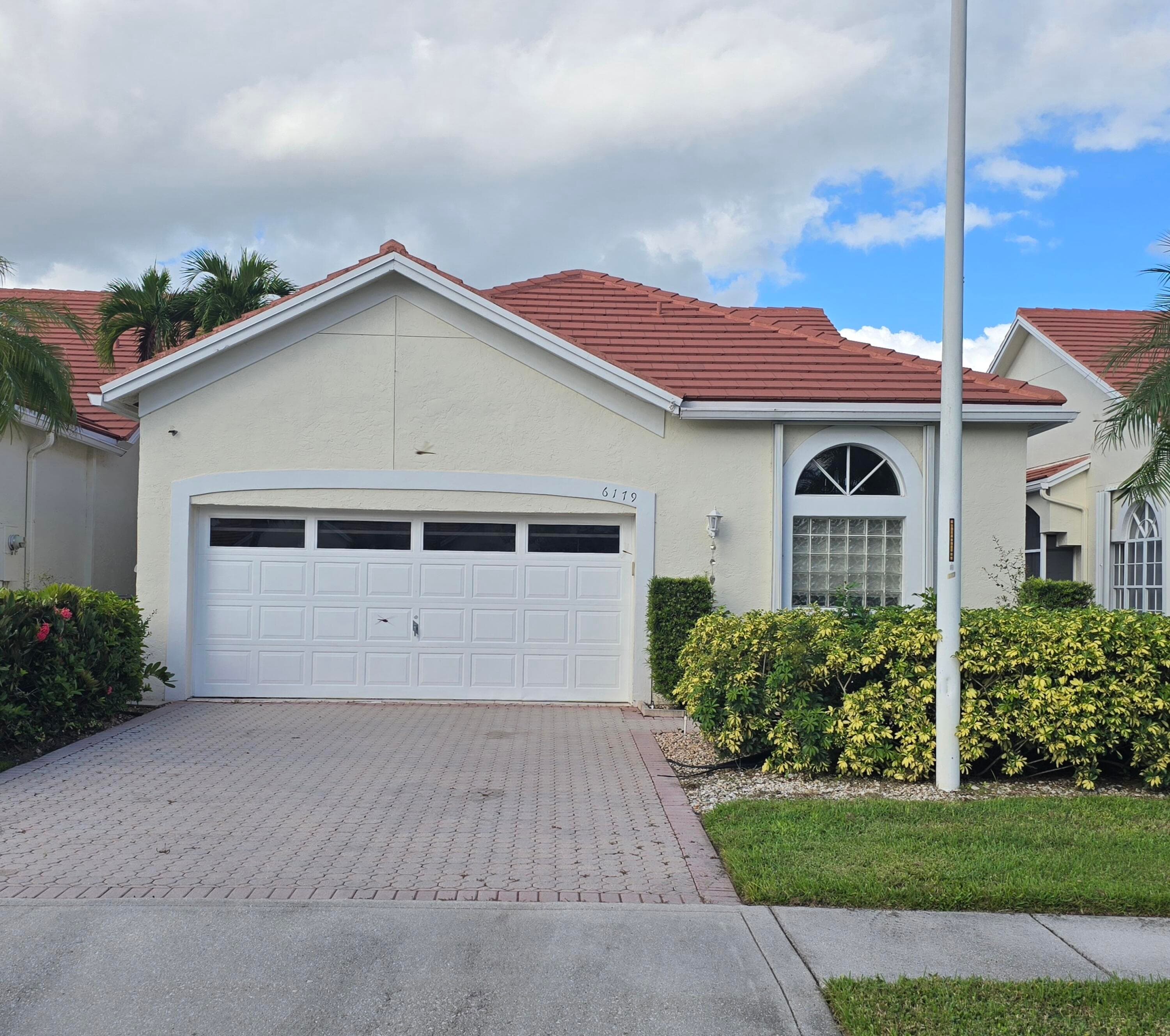 6179 Bear Creek Court, Lake Worth, FL 33467 — photo 1 of 35