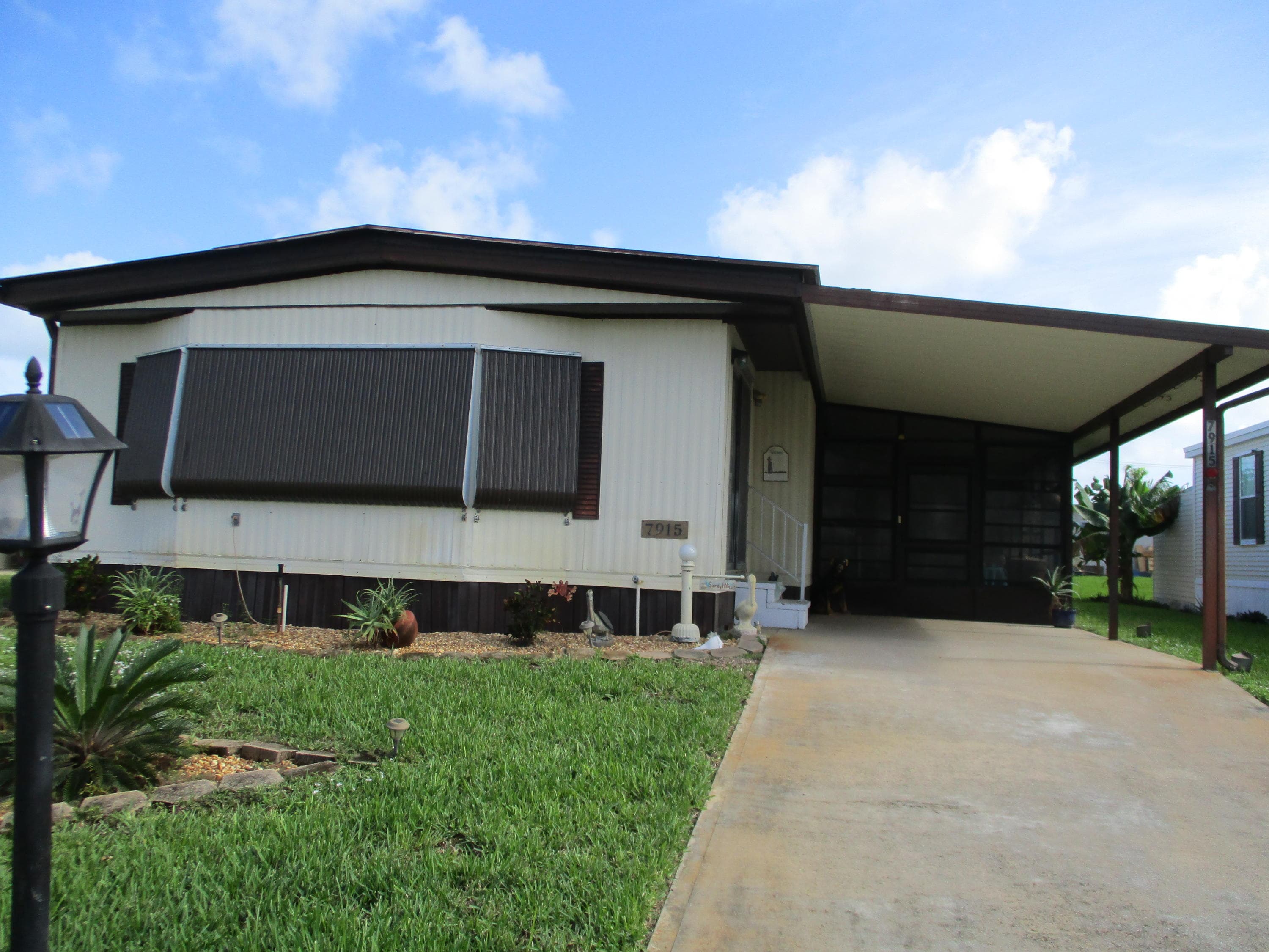 7915 SE Independence Avenue, Hobe Sound, FL 33455 — photo 1 of 17
