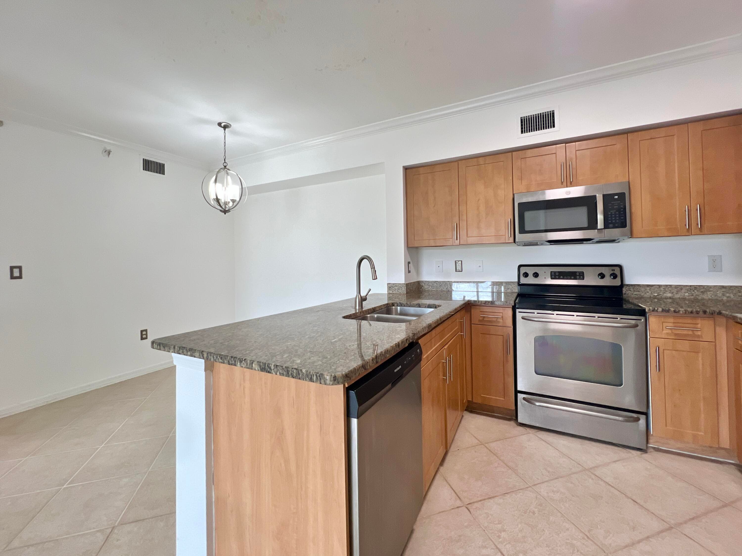6450 Emerald Dunes Drive 301, West Palm Beach, FL 33411 — photo 1 of 13