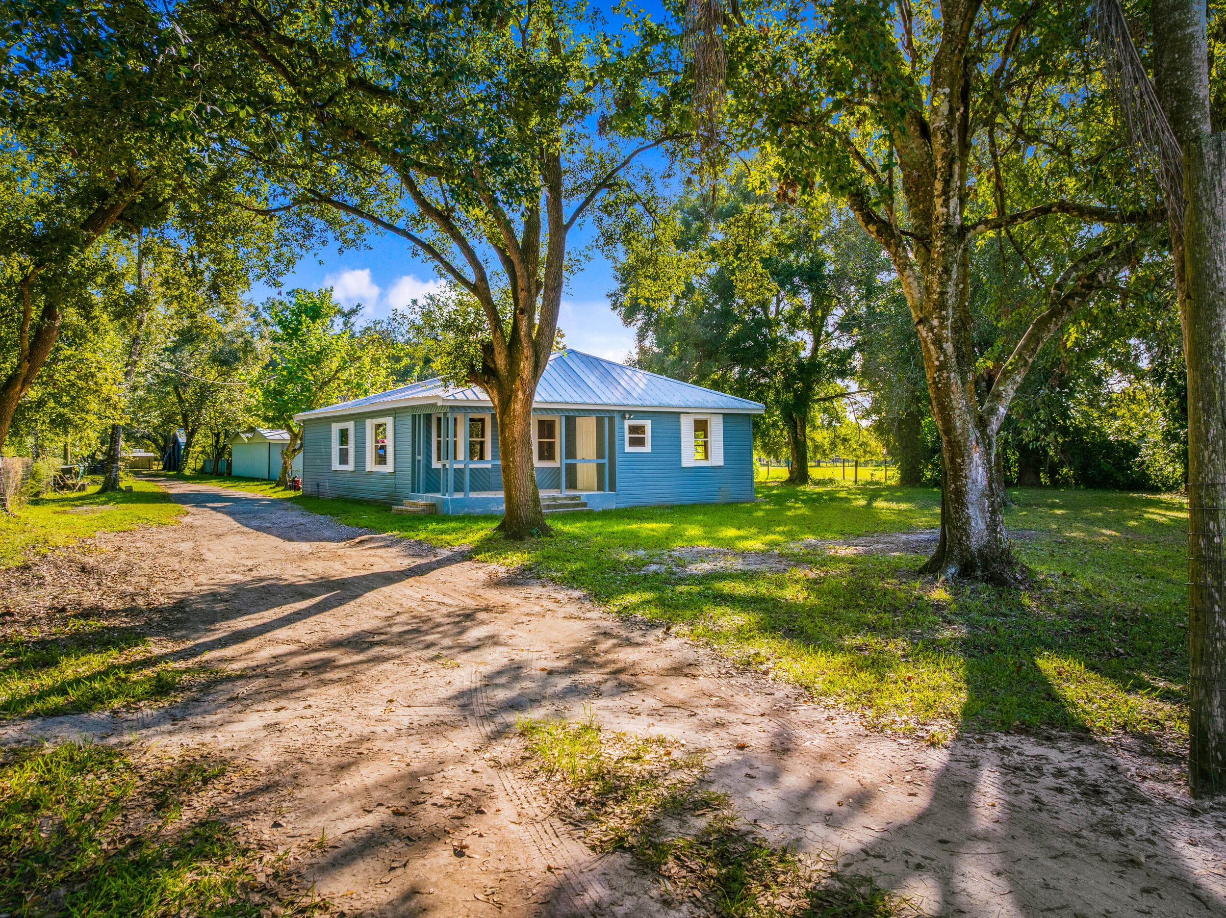 250 NW 98th Street, Okeechobee, FL 34972 — photo 2 of 39