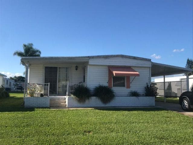 6948 SE Delegate Street, Hobe Sound, FL 33455 — photo 2 of 17