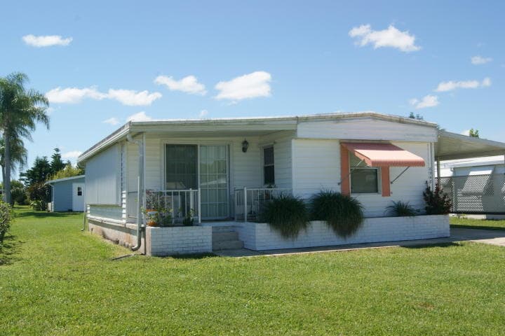 6948 SE Delegate Street, Hobe Sound, FL 33455 — photo 1 of 17