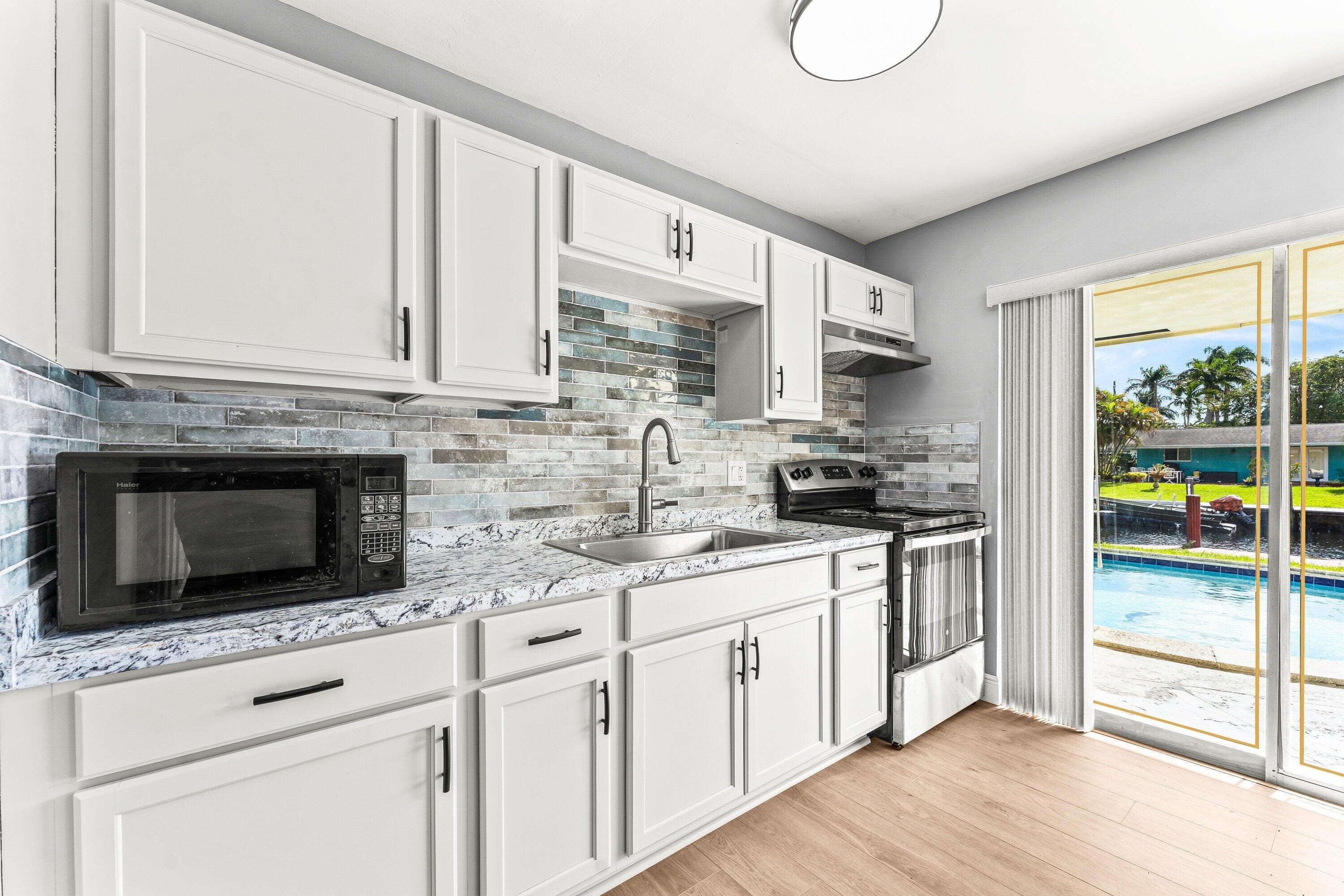 2000 NW 33rd Court, Oakland Park, FL 33309 — photo 13 of 47