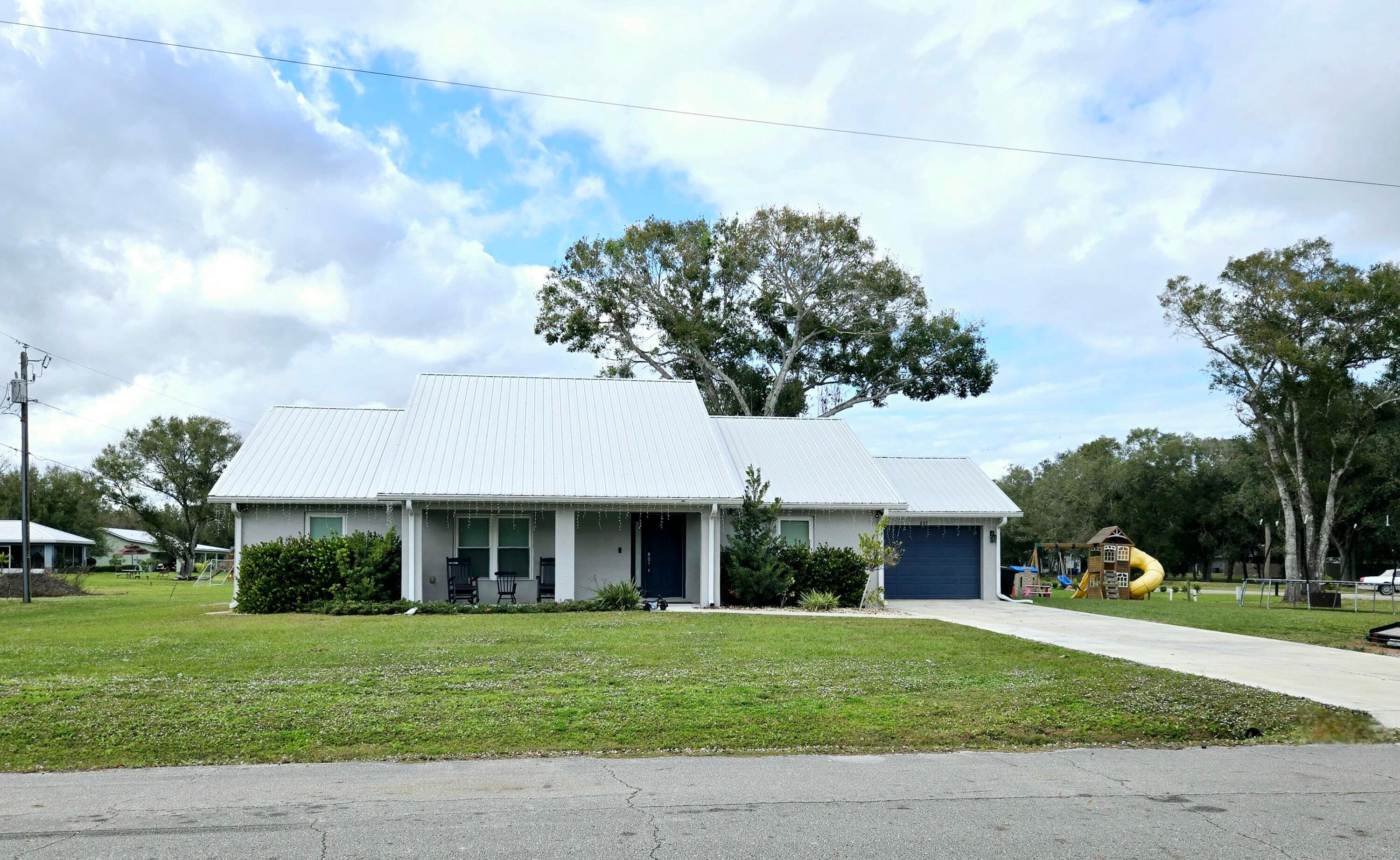 603 NW 11th Avenue, Okeechobee, FL 34972 — photo 1 of 28