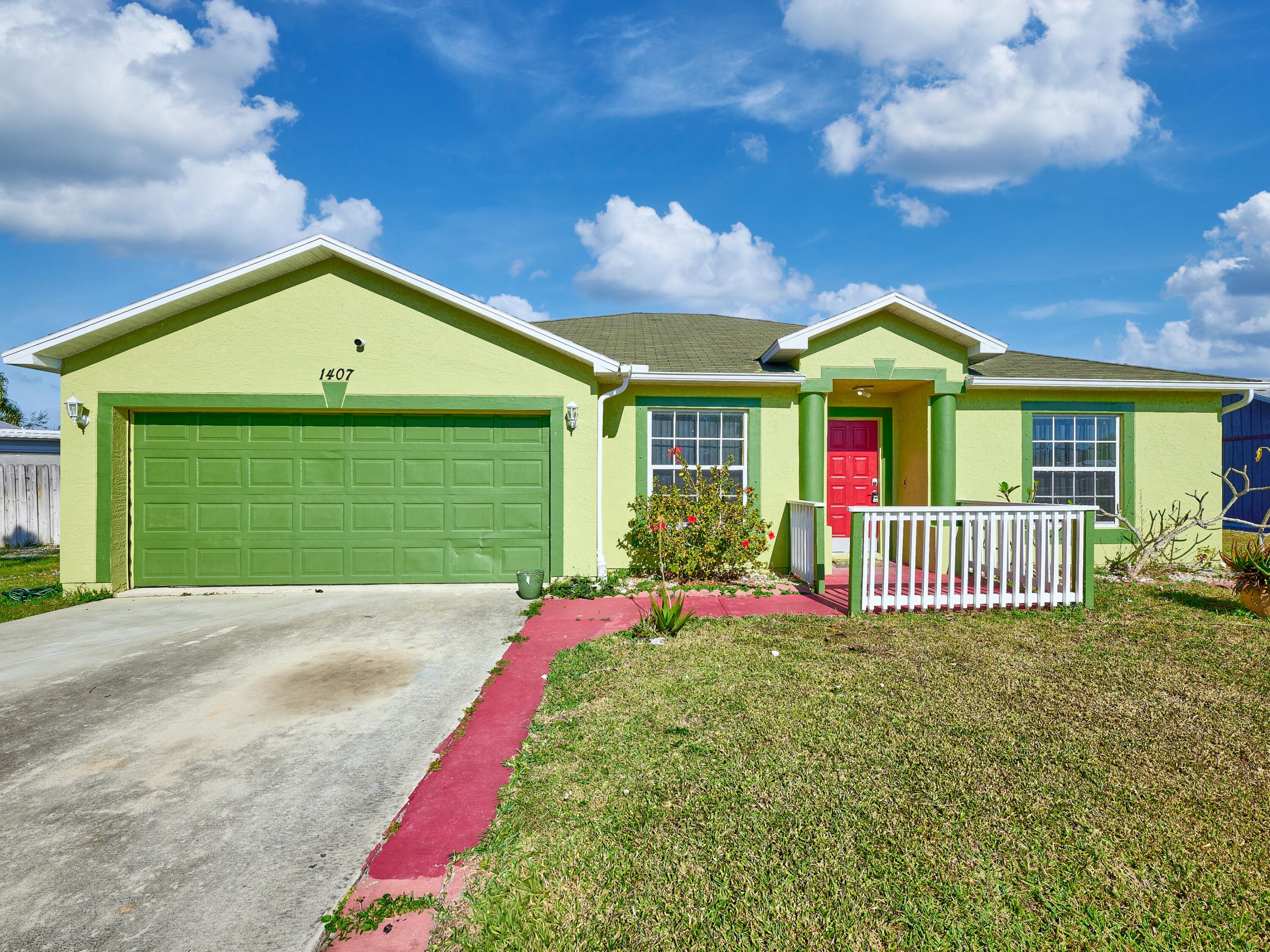 1407 SE Grapeland Avenue, Port St. Lucie, FL 34952 — photo 1 of 25