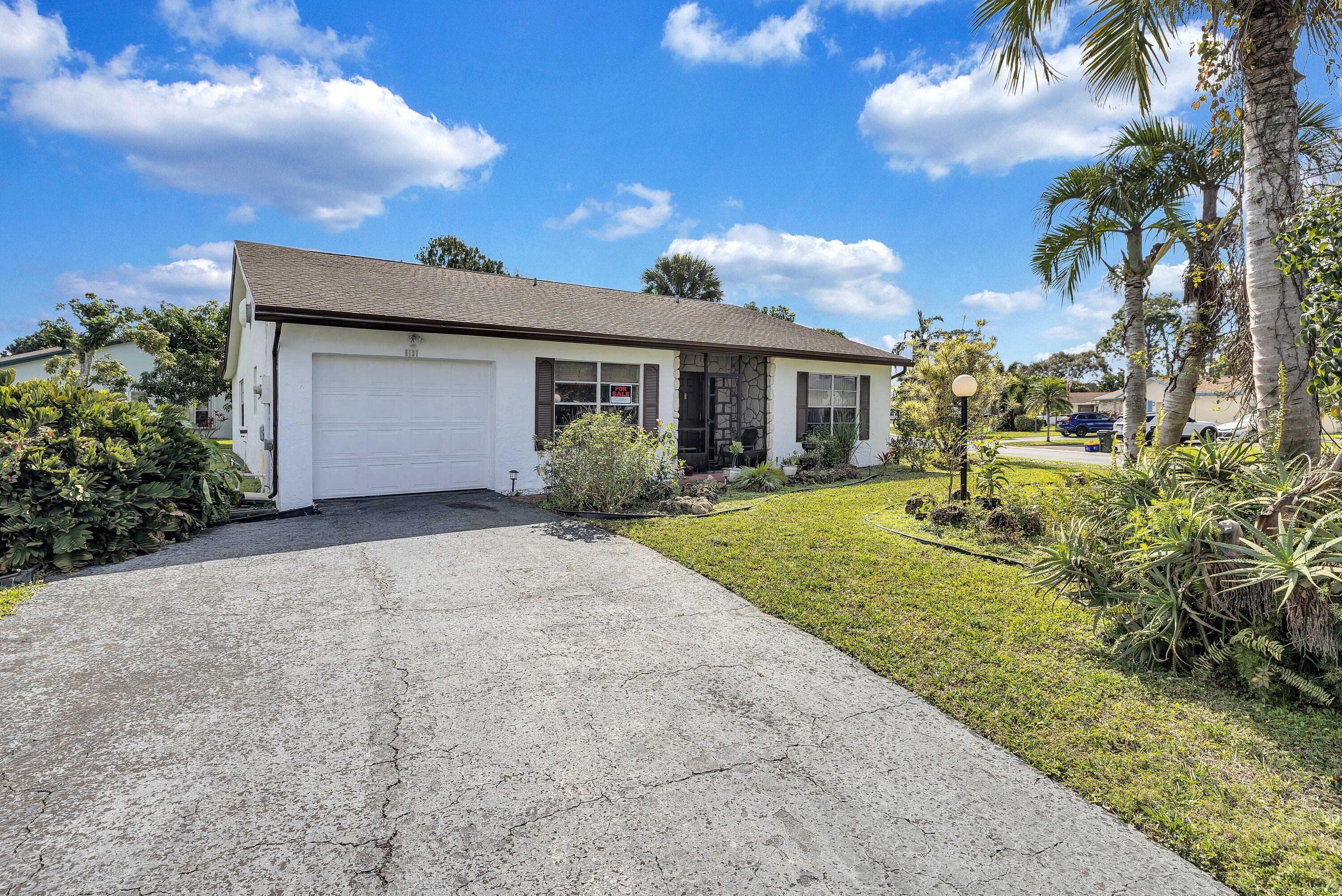6137 Rainbow Circle, Greenacres, FL 33463 — photo 1 of 27