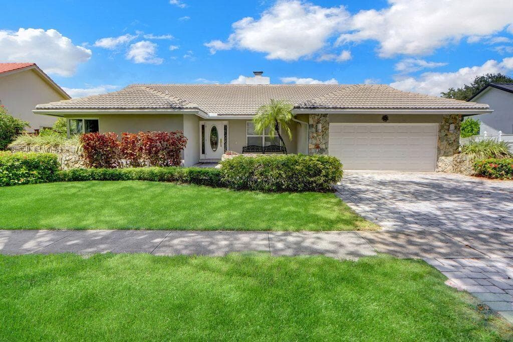 2665 NW 41st Street, Boca Raton, FL 33434 — photo 1 of 27