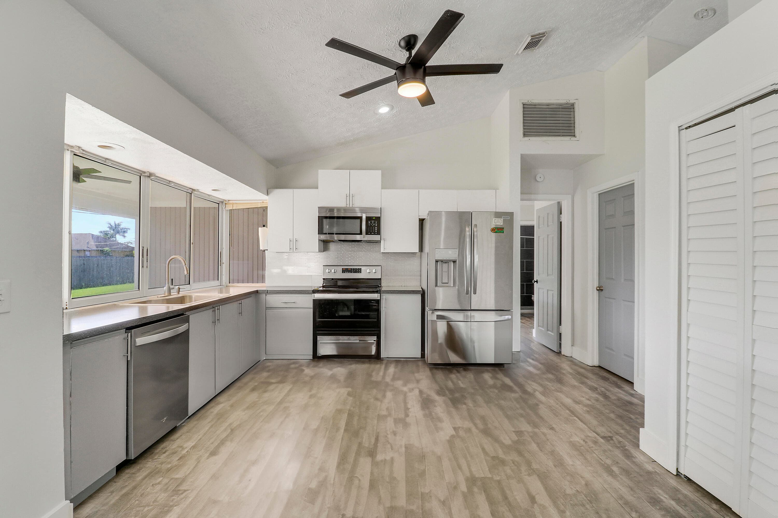1254 SW Asturia Avenue, Port St. Lucie, FL 34953 — photo 24 of 31