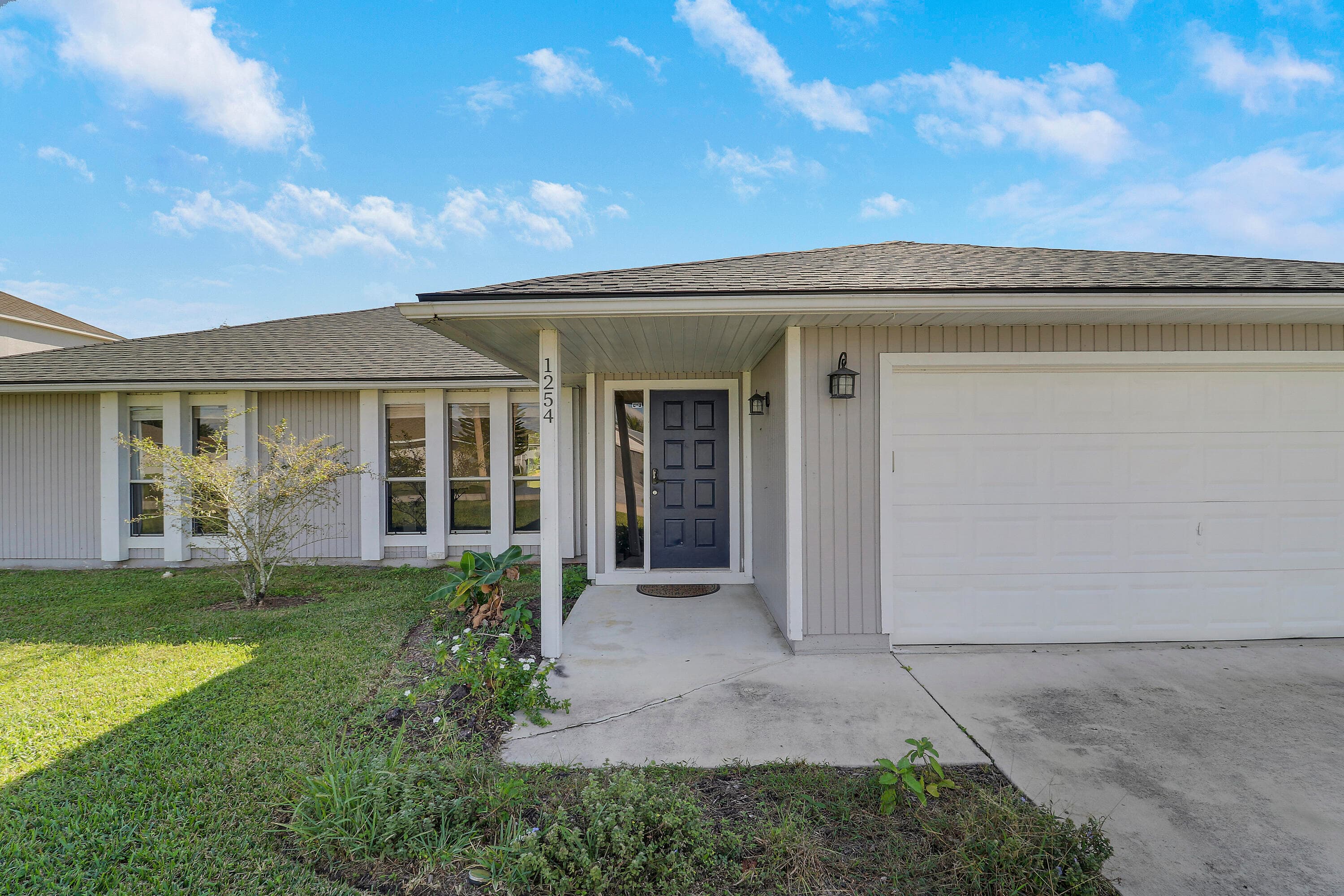 1254 SW Asturia Avenue, Port St. Lucie, FL 34953 — photo 3 of 31