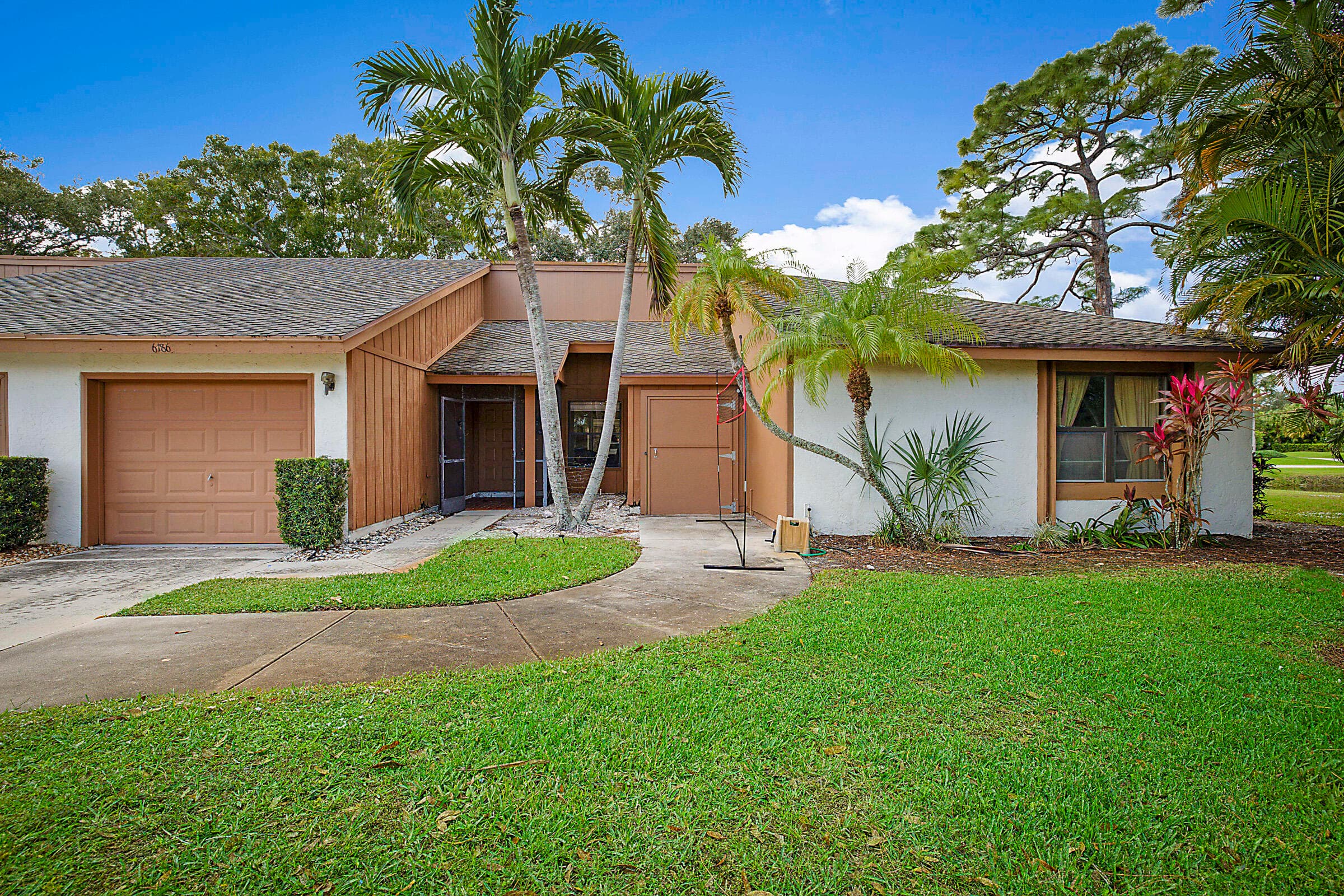 6186 Brandon Street, Palm Beach Gardens, FL 33418 — photo 1 of 54