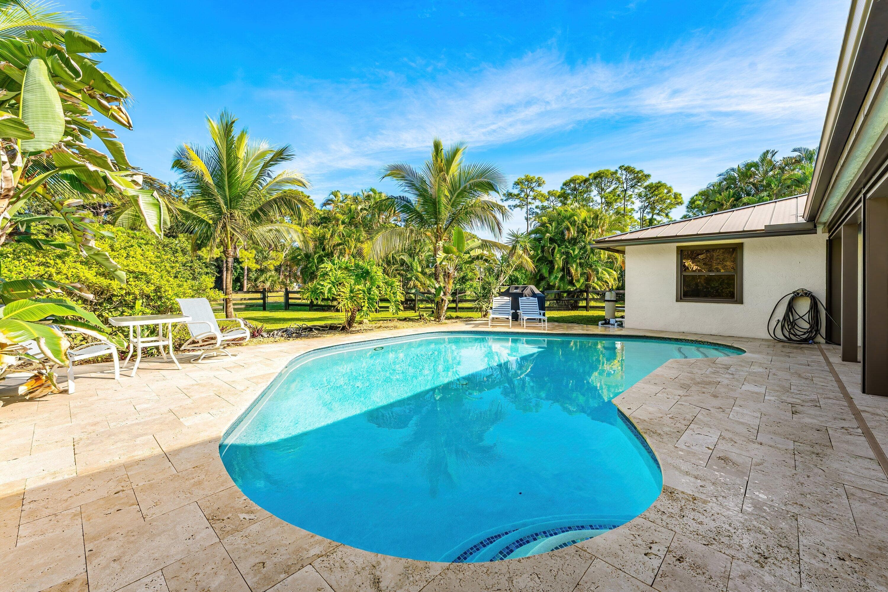 6799 149th Place N, Palm Beach Gardens, FL 33418 — photo 1 of 52
