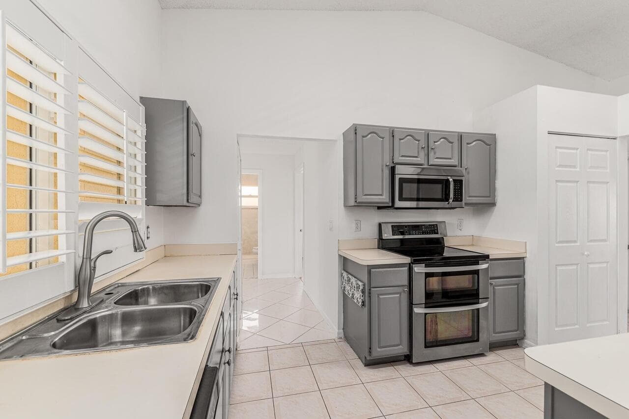 1126 SW Calmar Avenue, Port St. Lucie, FL 34953 — photo 6 of 23