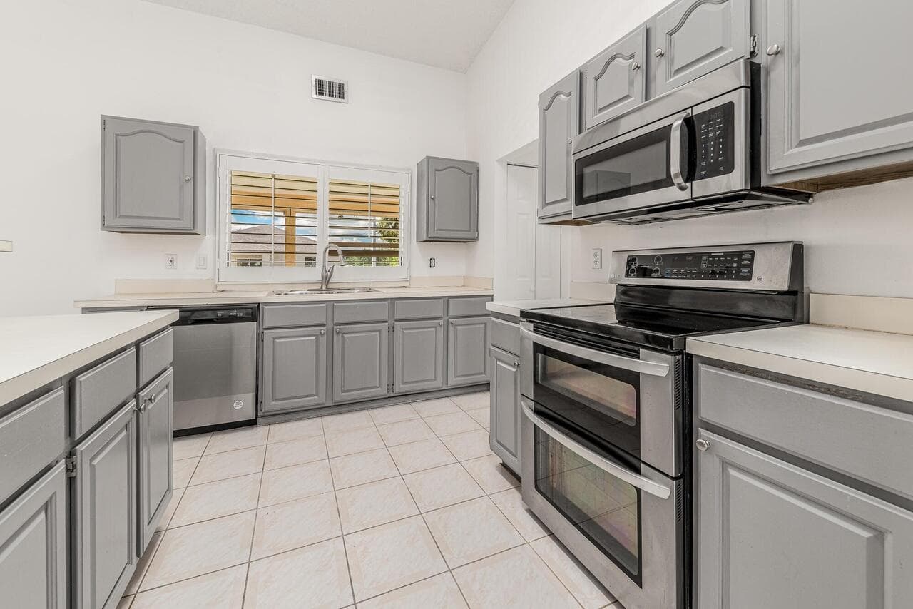 1126 SW Calmar Avenue, Port St. Lucie, FL 34953 — photo 8 of 23