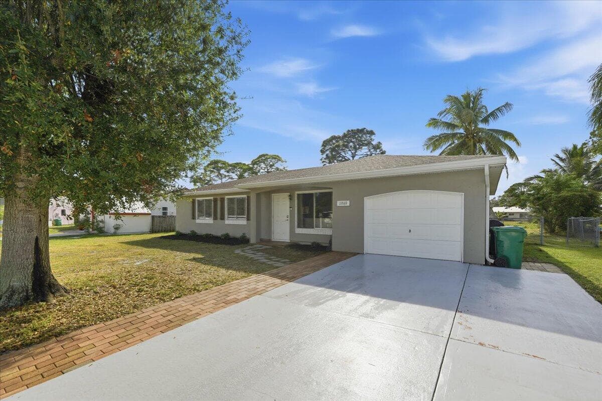1969 SE Redwing Cir Circle, Port St. Lucie, FL 34952 — photo 1 of 41