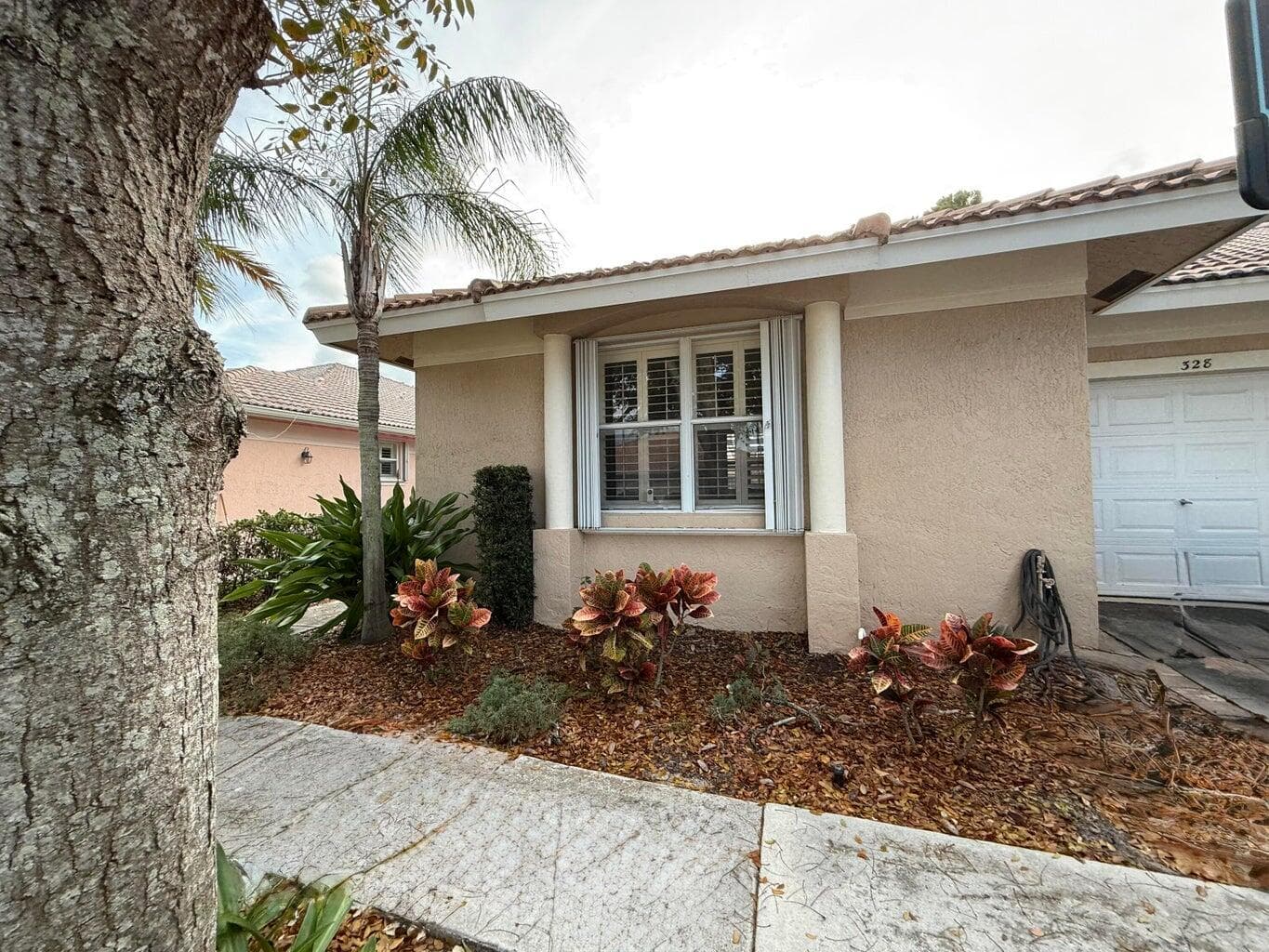 328 W Coral Trace Circle, Delray Beach, FL 33445 — photo 1 of 36